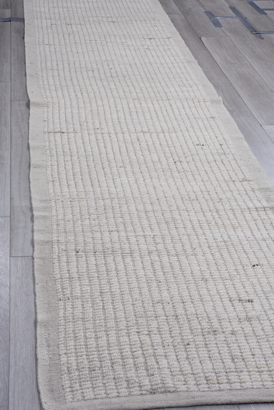 3' x 12' one-of-a-kind handmade vintage Tulu runner rug. Color palette: dark gray, gainsboro, gray, light gray, off-white