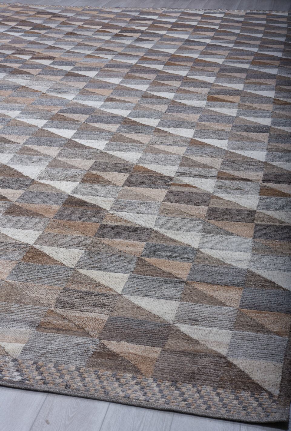 13' x 20' one-of-a-kind handmade vintage Tulu oversize rug. Color palette: black, blue, brown, charcoal, dark gray