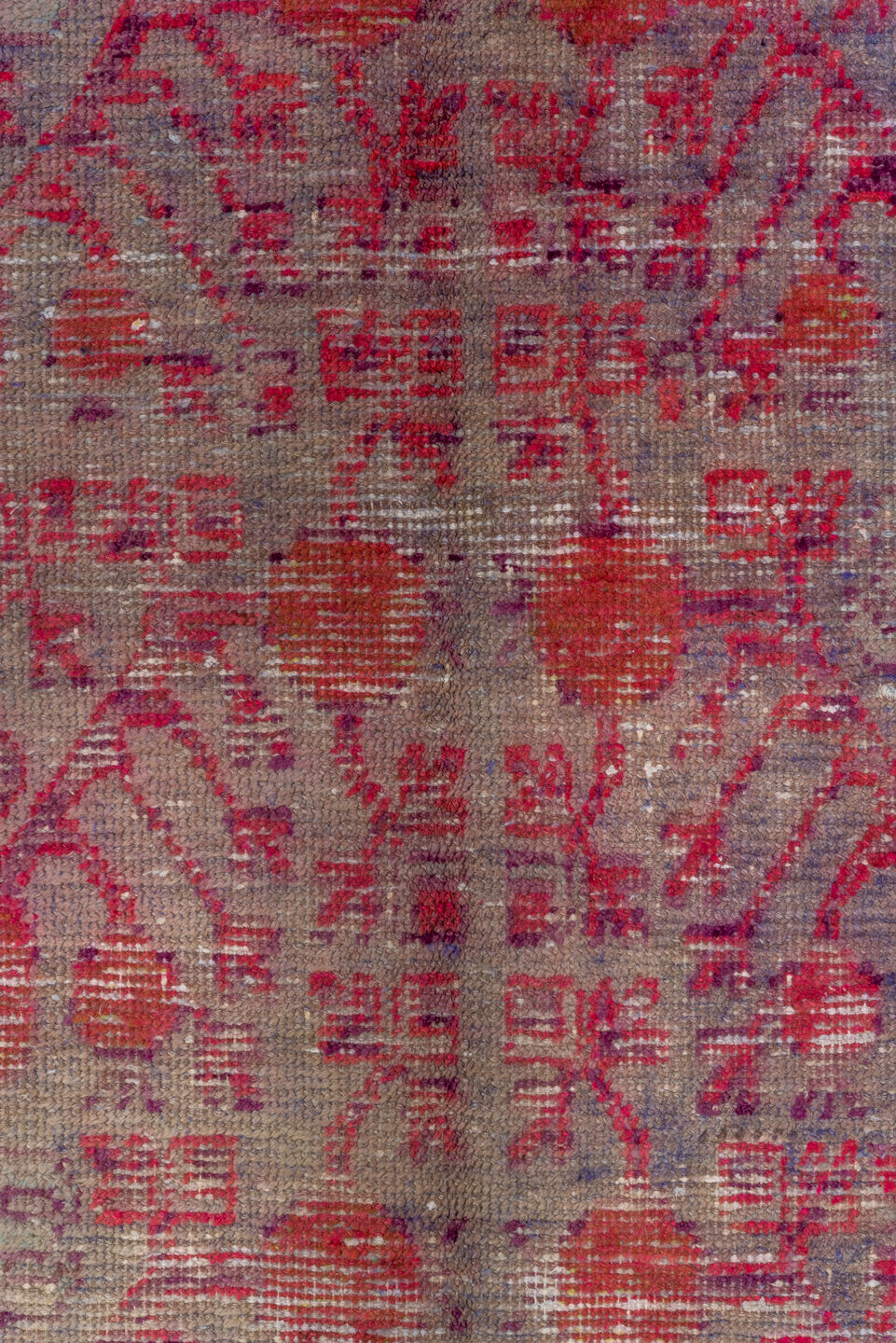 5' x 9' one-of-a-kind handmade vintage Khotan medium size rug. Color palette: brown, pink, red, rosy brown