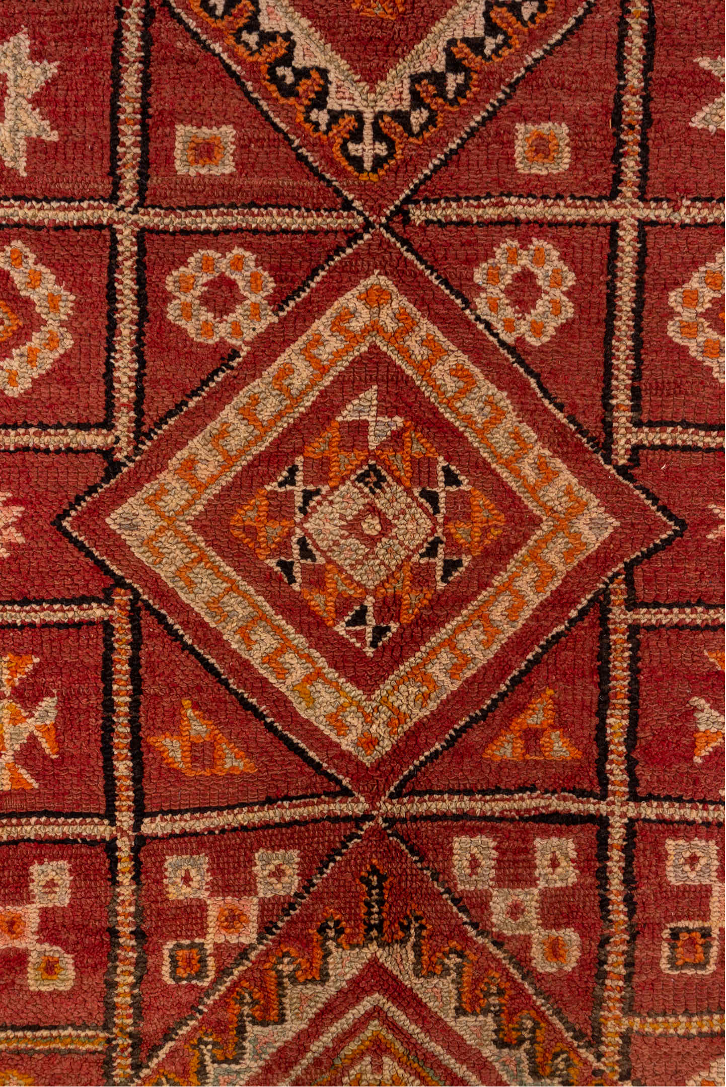 6' x 10' one-of-a-kind handmade vintage Moroccan large size rug. Color palette: red, brown, pink