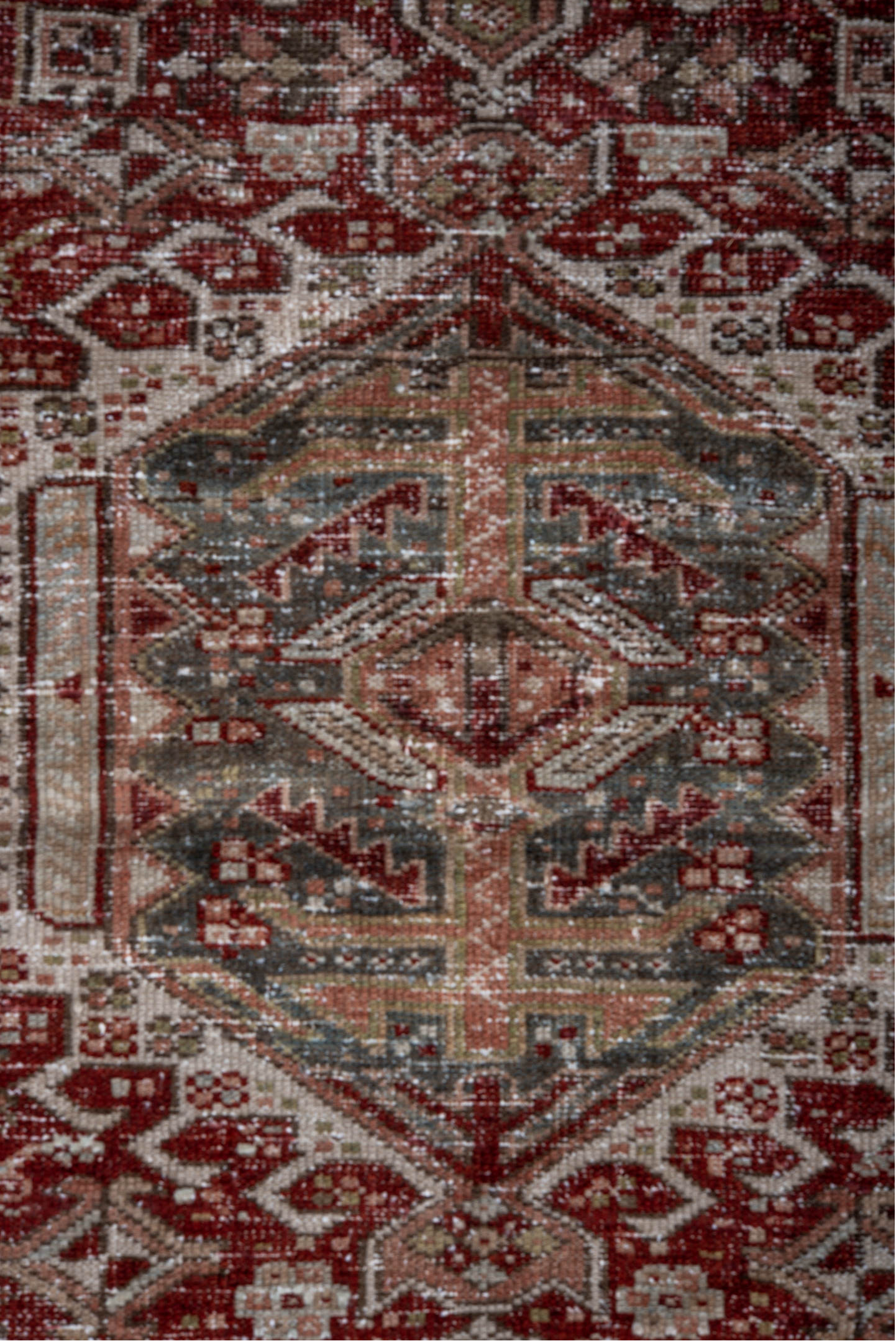 4' x 6' one-of-a-kind handmade vintage Karaje small size rug. Color palette: pink, off-white, gray, light gray, brown, red