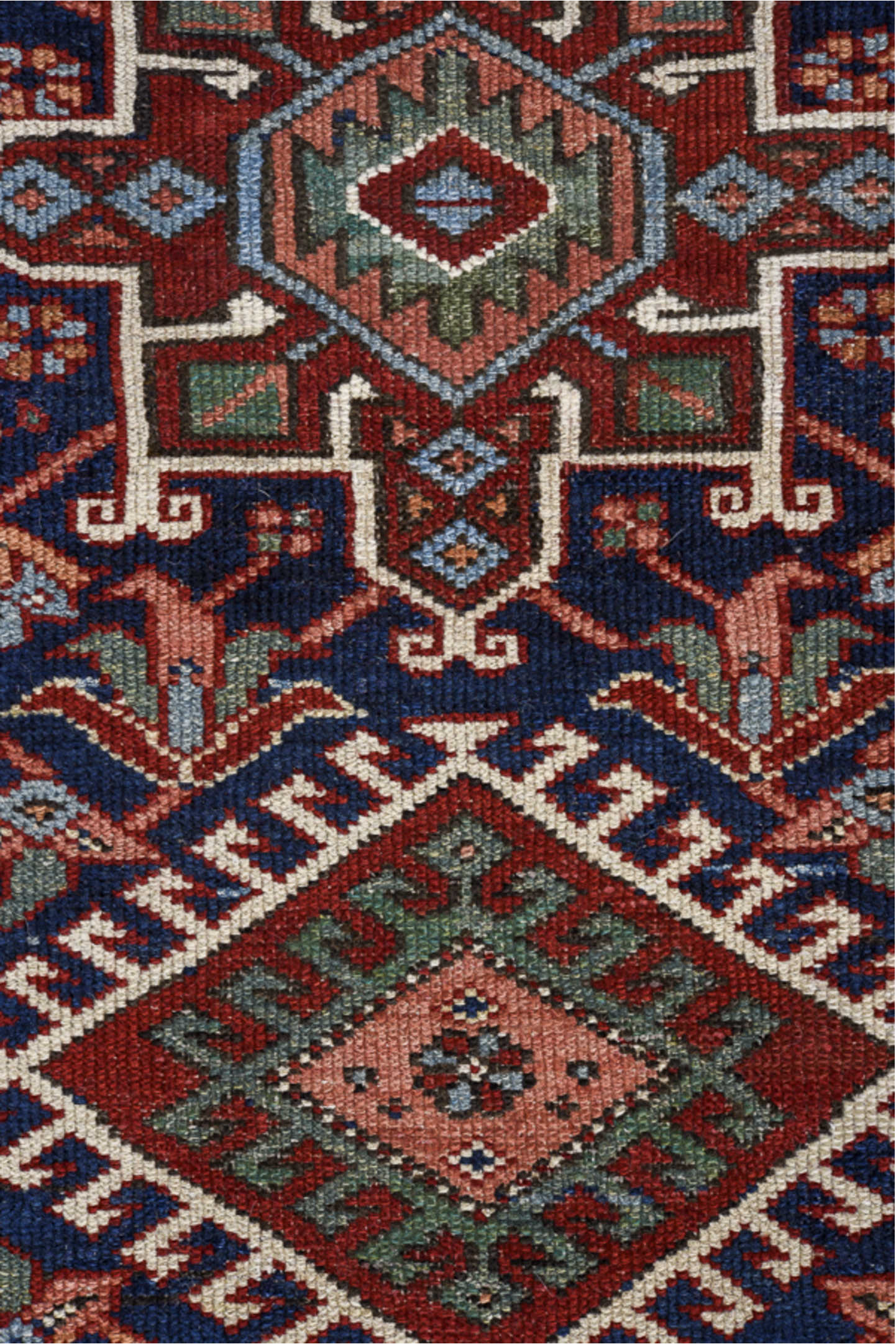 3' x 8' one-of-a-kind handmade vintage Karaje runner rug. Color palette: black, blue, brown, gray, pink, red, slate gray