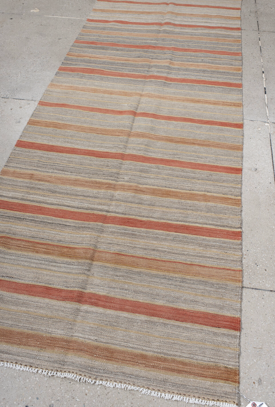 3' x 9' one-of-a-kind handmade vintage Kilim runner rug. Color palette: brown, gray, light gray, off-white, orange, dim gray