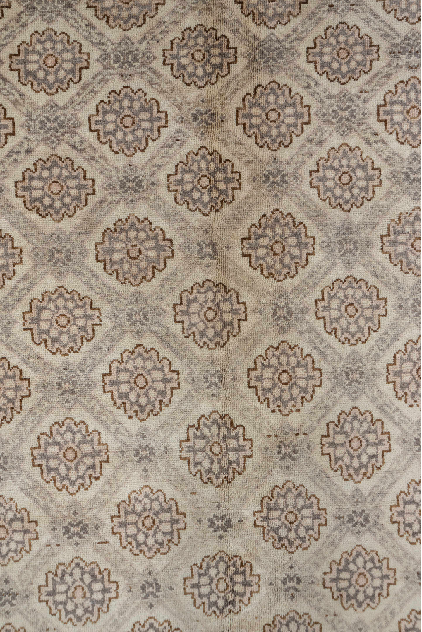 5' x 10' one-of-a-kind handmade vintage Konya medium size rug. Color palette: brown, gray, off-white, orange, pink