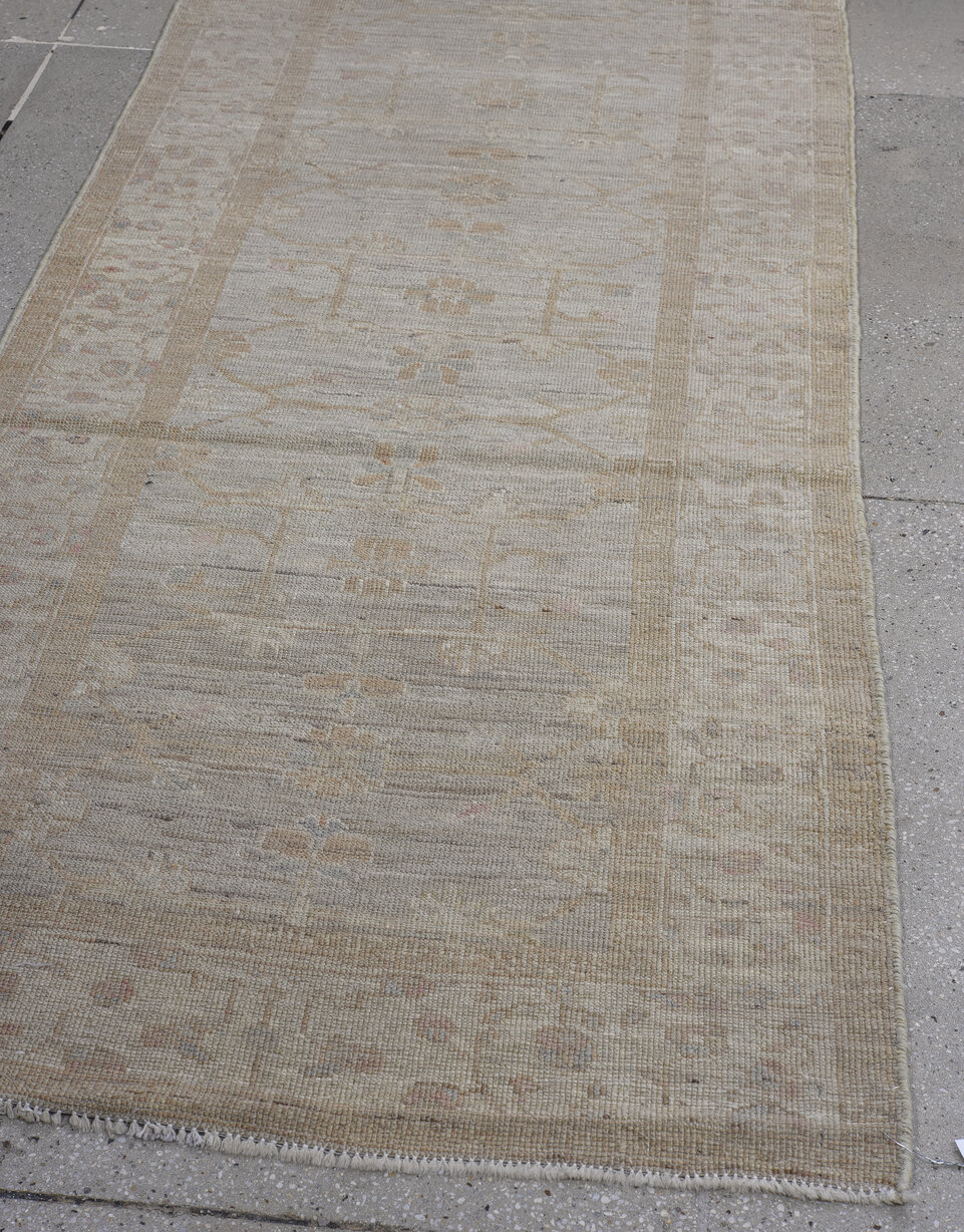 3' x 9' one-of-a-kind handmade vintage Oushak runner rug. Color palette: dark gray, gray, light gray, off-white, pink