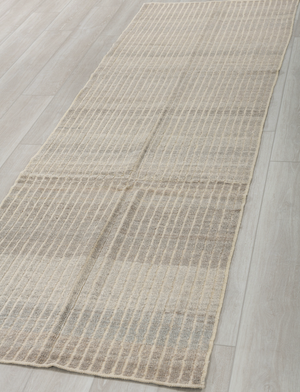 3' x 9' one-of-a-kind handmade vintage Tulu runner rug. Color palette: dim gray, gray, light gray, off-white, pink, silver