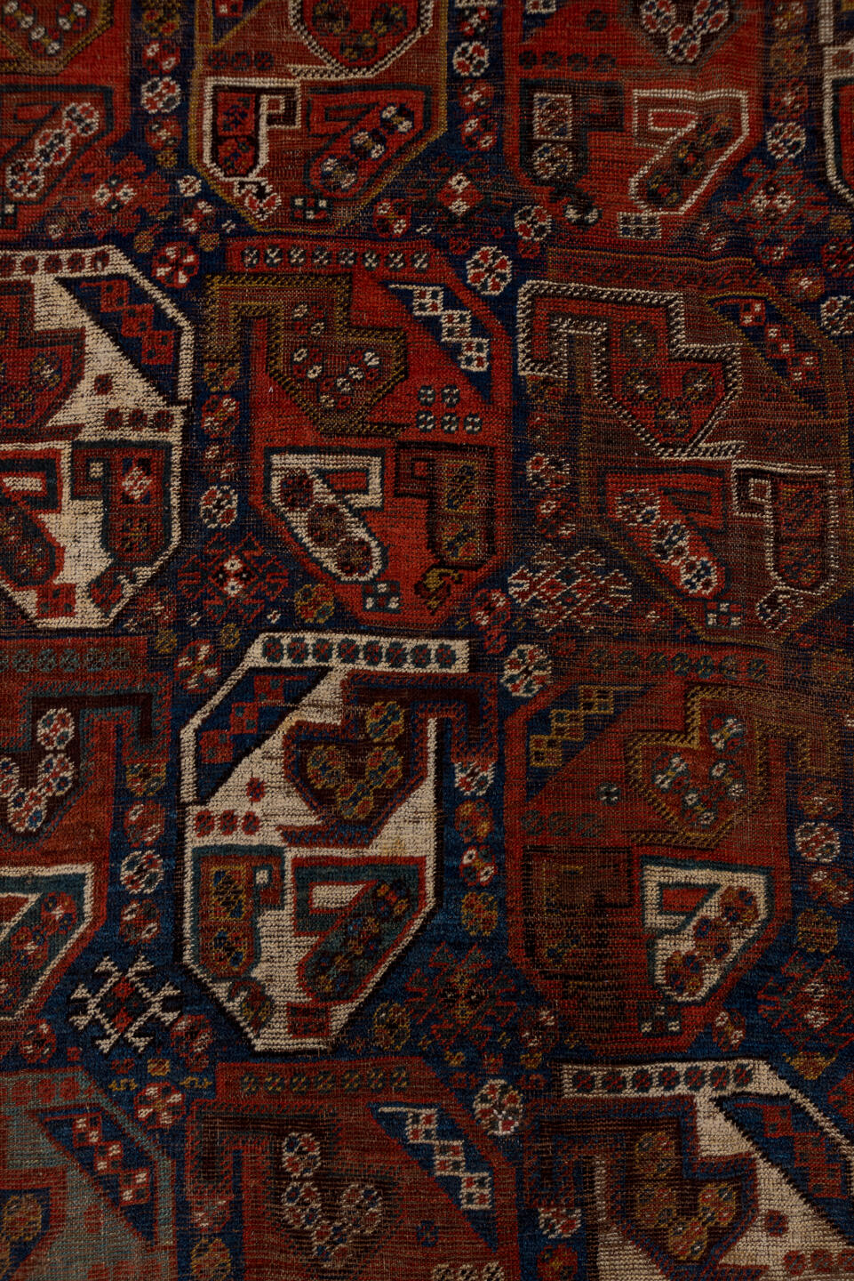 7' x 9' one-of-a-kind handmade vintage Shiraz rug. Color palette: black, blue, brown, gray, light gray, off-white, orange