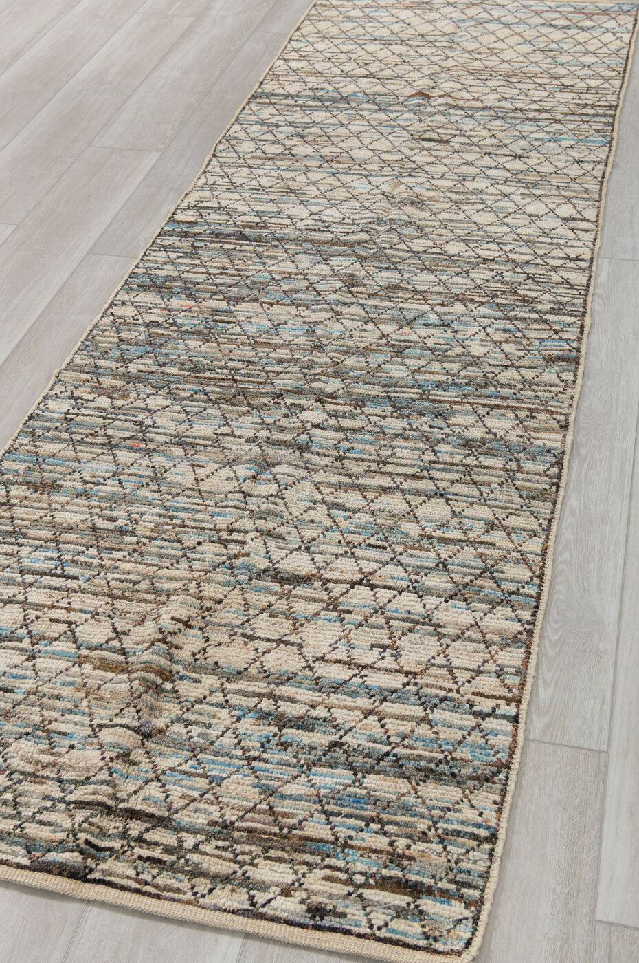 2' x 9' one-of-a-kind handmade vintage Tulu runner rug. Color palette: black, blue, brown, dark gray, gray, light gray