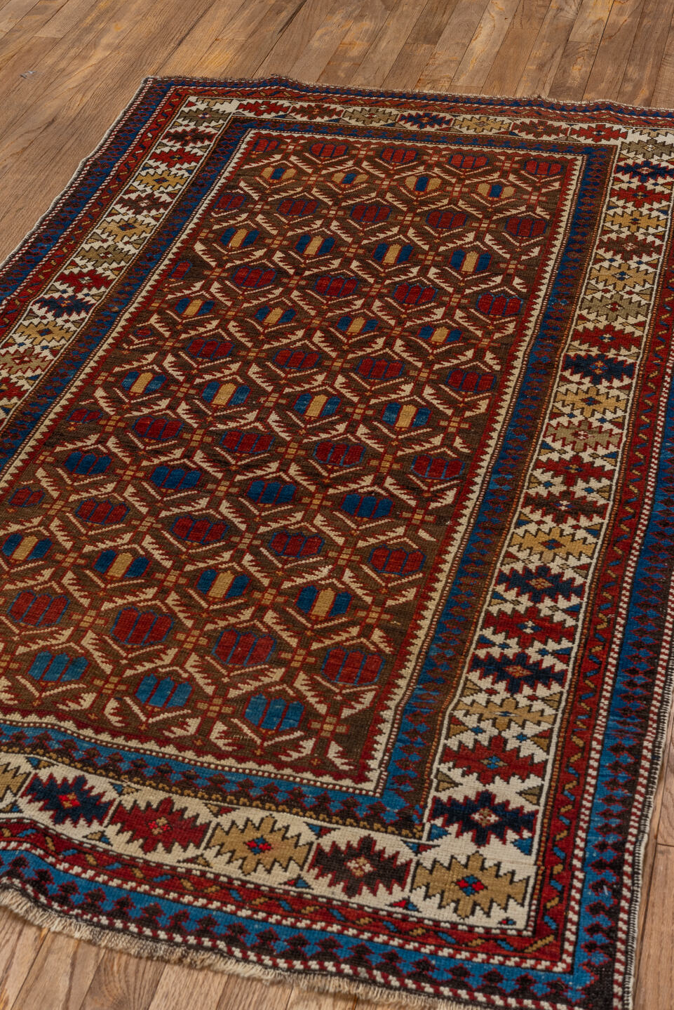 3' x 5' one-of-a-kind handmade vintage Shirvan small size rug. Color palette: blue, brown, dark gray, dark red, gray