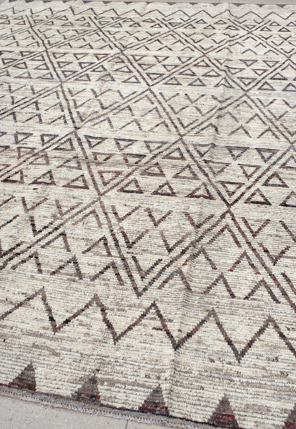 9' x 11' one-of-a-kind handmade vintage Tulu large size rug. Color palette: gray, black, light gray, off-white, pink, brown