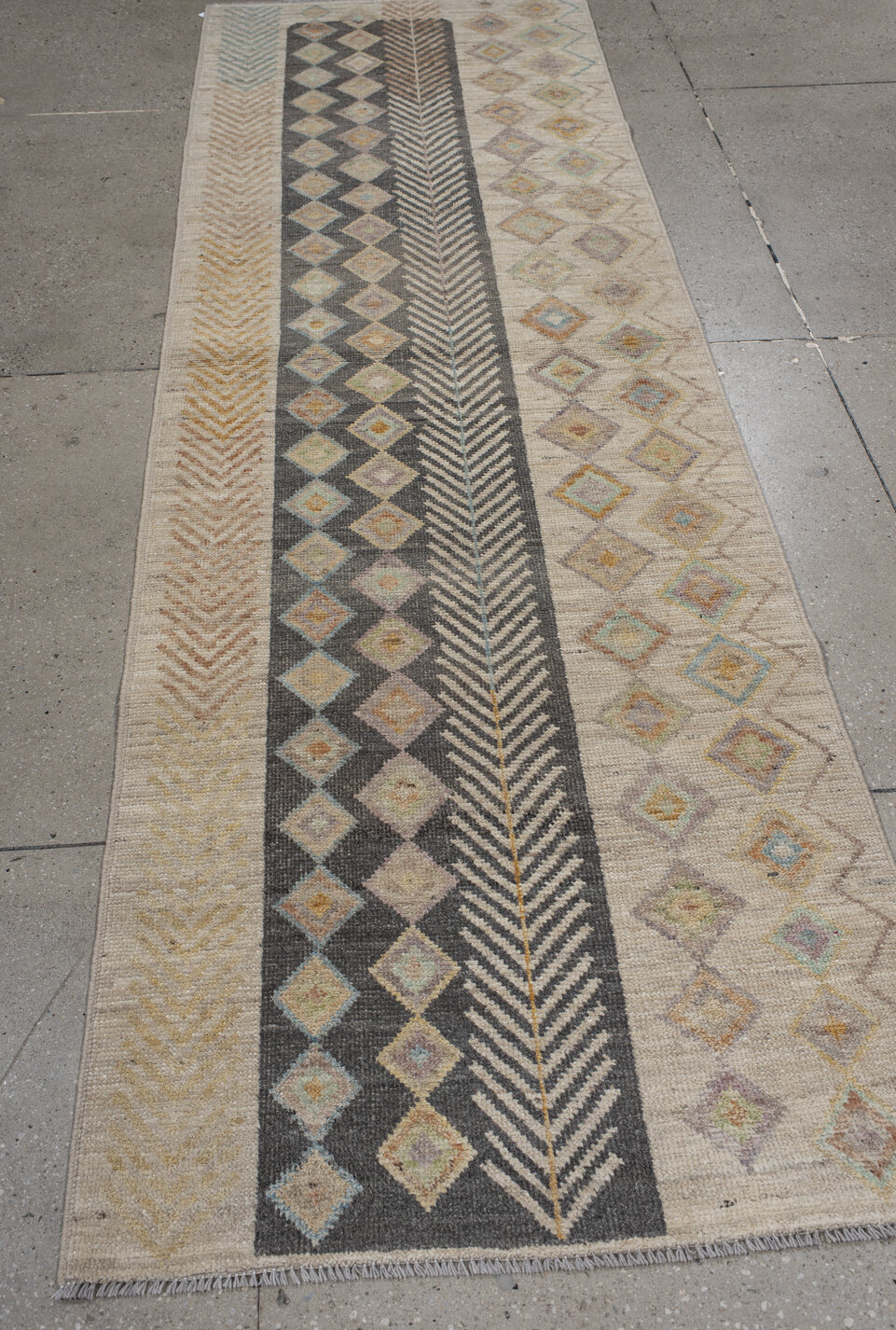 3' x 9' one-of-a-kind handmade vintage Kilim runner rug. Color palette: brown, gray, off-white, light gray, black, orange
