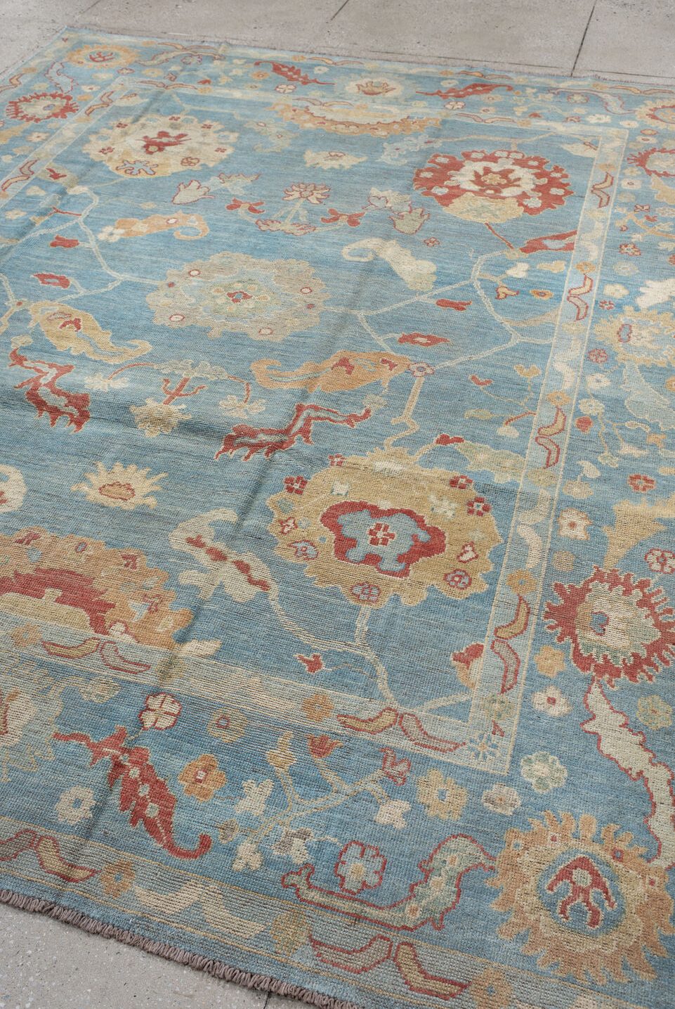 7' x 9' one-of-a-kind handmade vintage Oushak rug. Color palette: red, brown, gray, light blue, light gray, off-white, pink