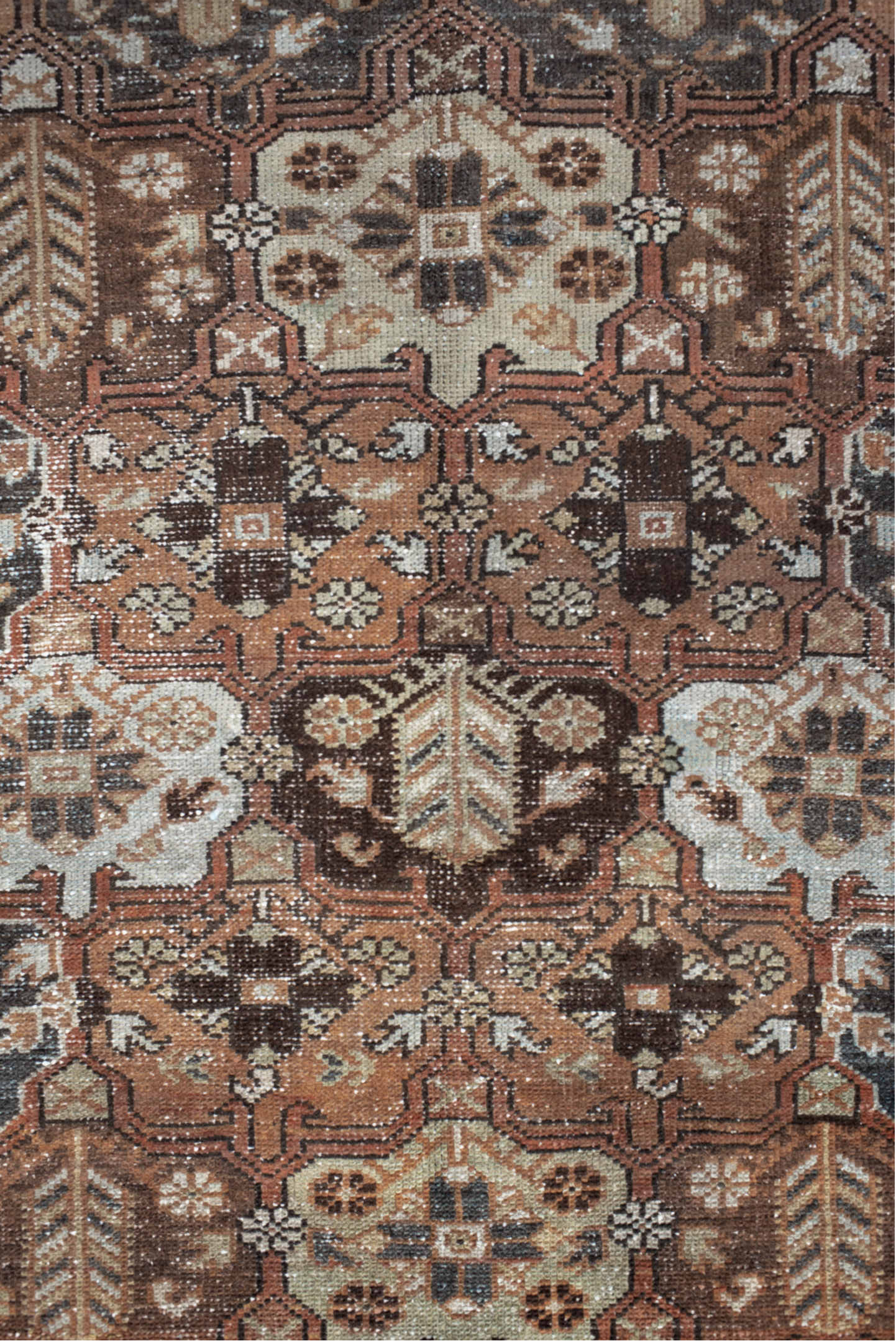 4' x 7' one-of-a-kind handmade vintage Baktiary rug. Color palette: black, brown, gray, light gray, off-white, pink, red