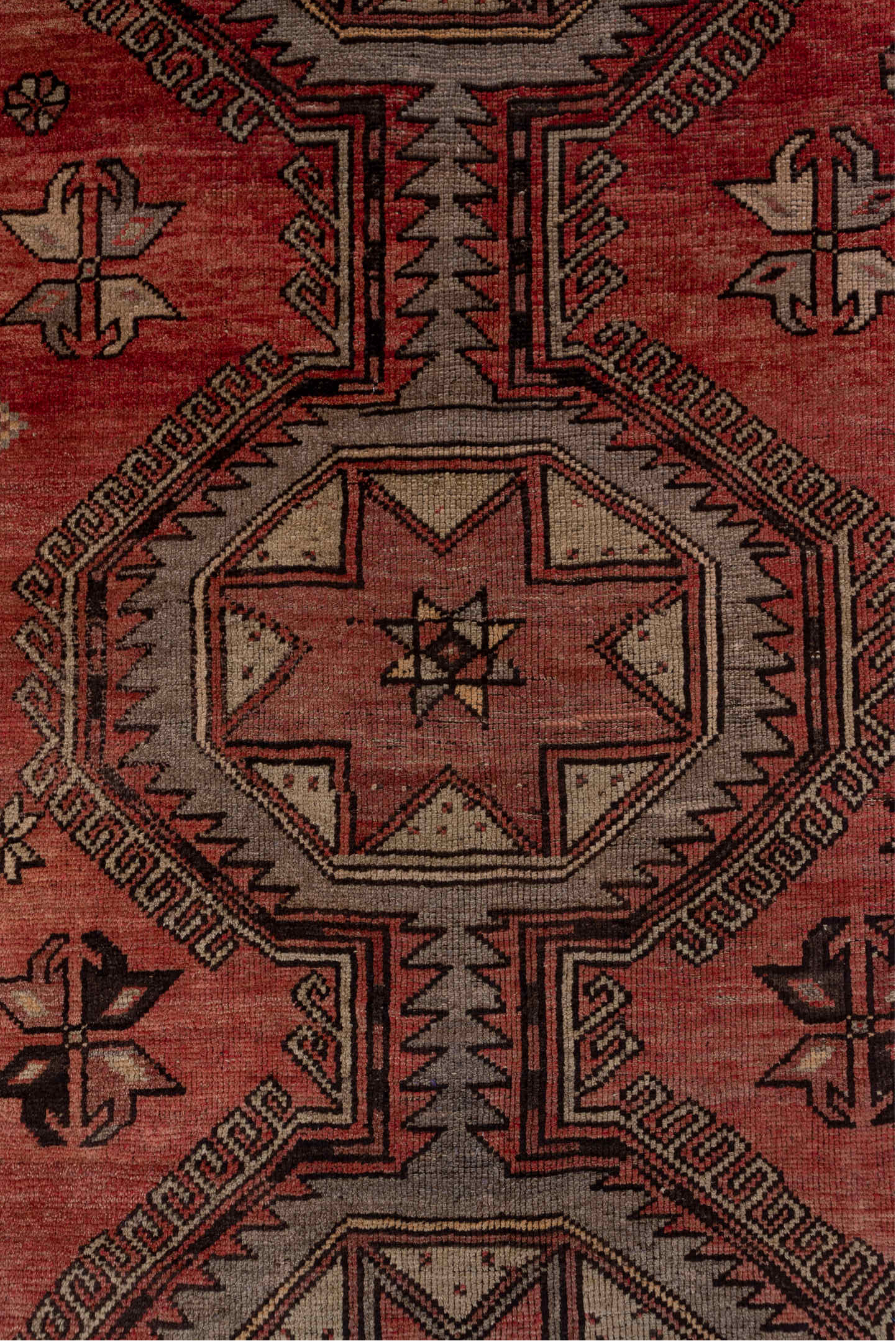 4' x 10' one-of-a-kind handmade vintage Oushak runner rug. Color palette: brown, gray, pink, red, redwood