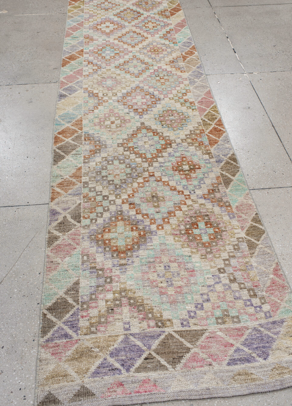 2' x 12' one-of-a-kind handmade vintage Tulu runner rug. Color palette: brown, dark gray, gray, light gray, off-white, pink