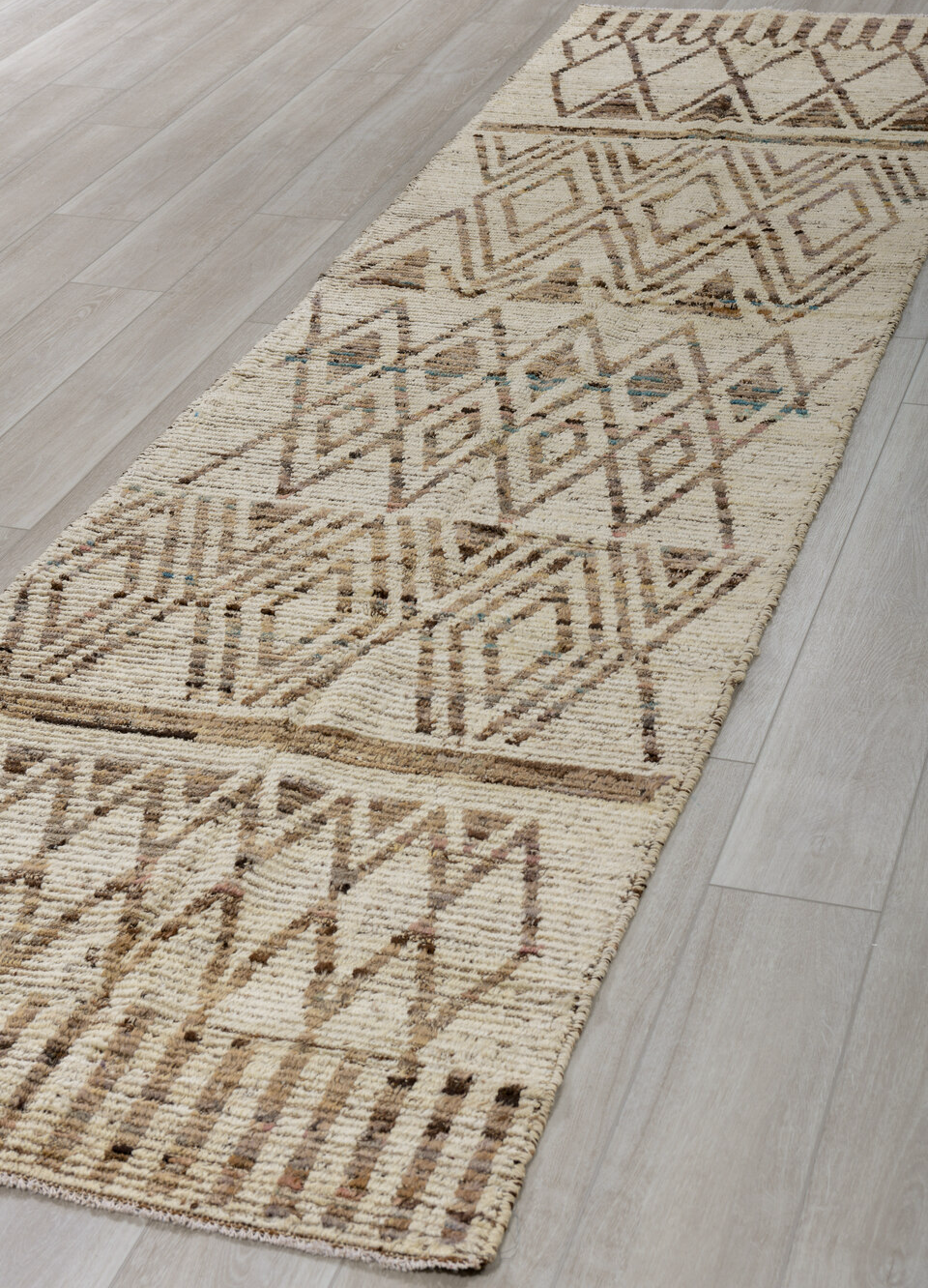 3' x 12' one-of-a-kind handmade vintage Tulu runner rug. Color palette: blue, brown, dark gray, gray, light gray, off-white