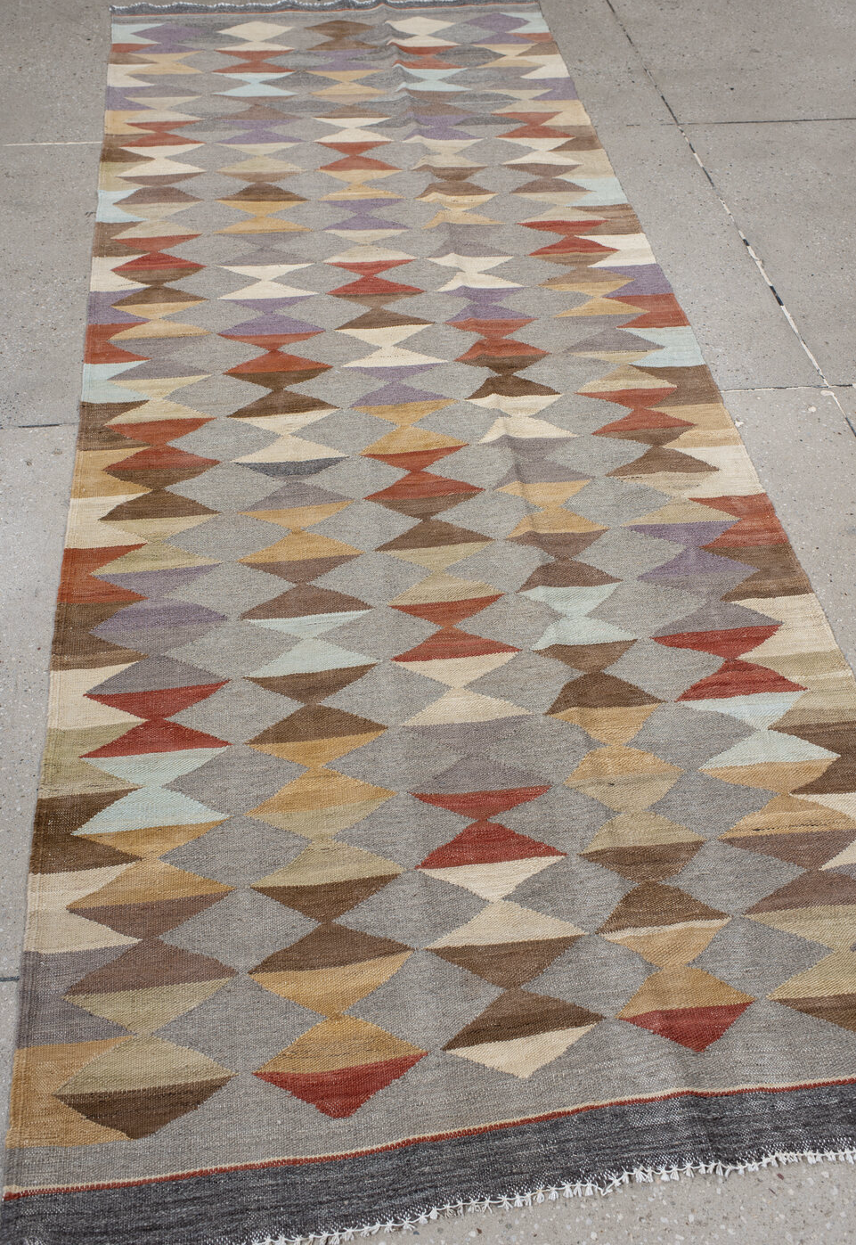 3' x 9' one-of-a-kind handmade vintage Kilim runner rug. Color palette: brown, dim gray, gray, light gray, off-white, orange