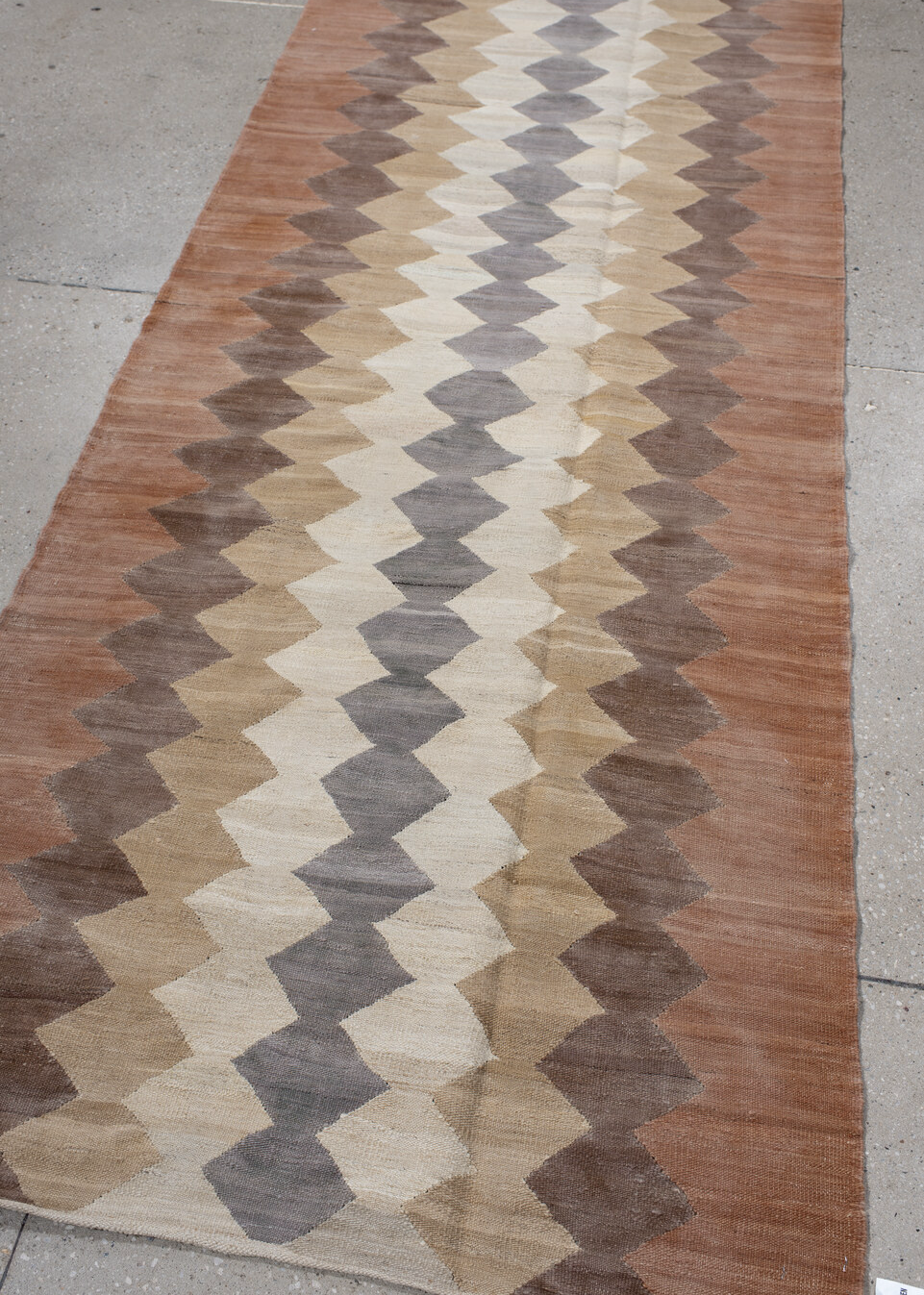3' x 9' one-of-a-kind handmade vintage Kilim runner rug. Color palette: brown, gray, light gray, off-white, pink