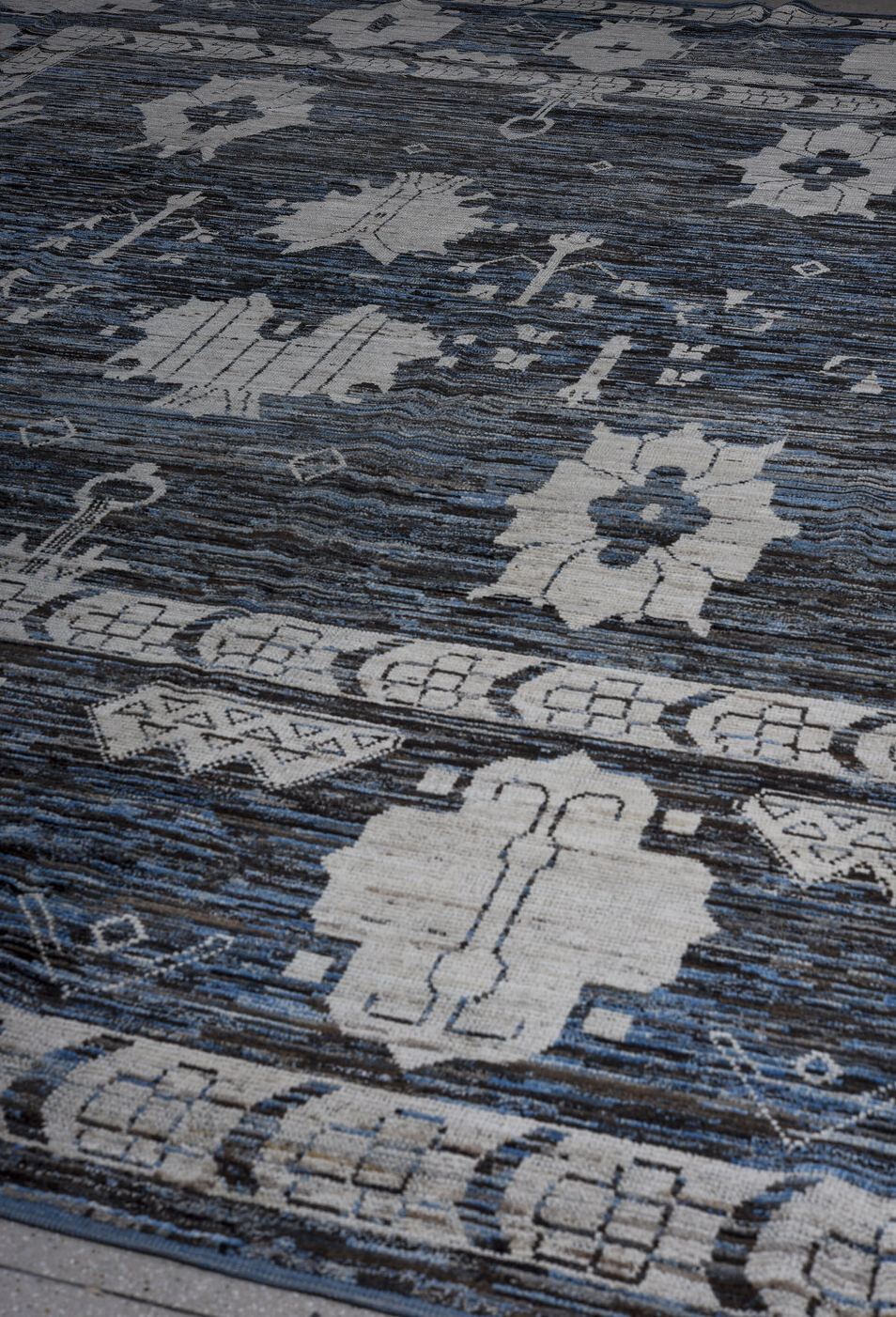 13' x 16' one-of-a-kind handmade vintage Tulu oversize rug. Color palette: black, blue, brown, charcoal, dim gray, gray