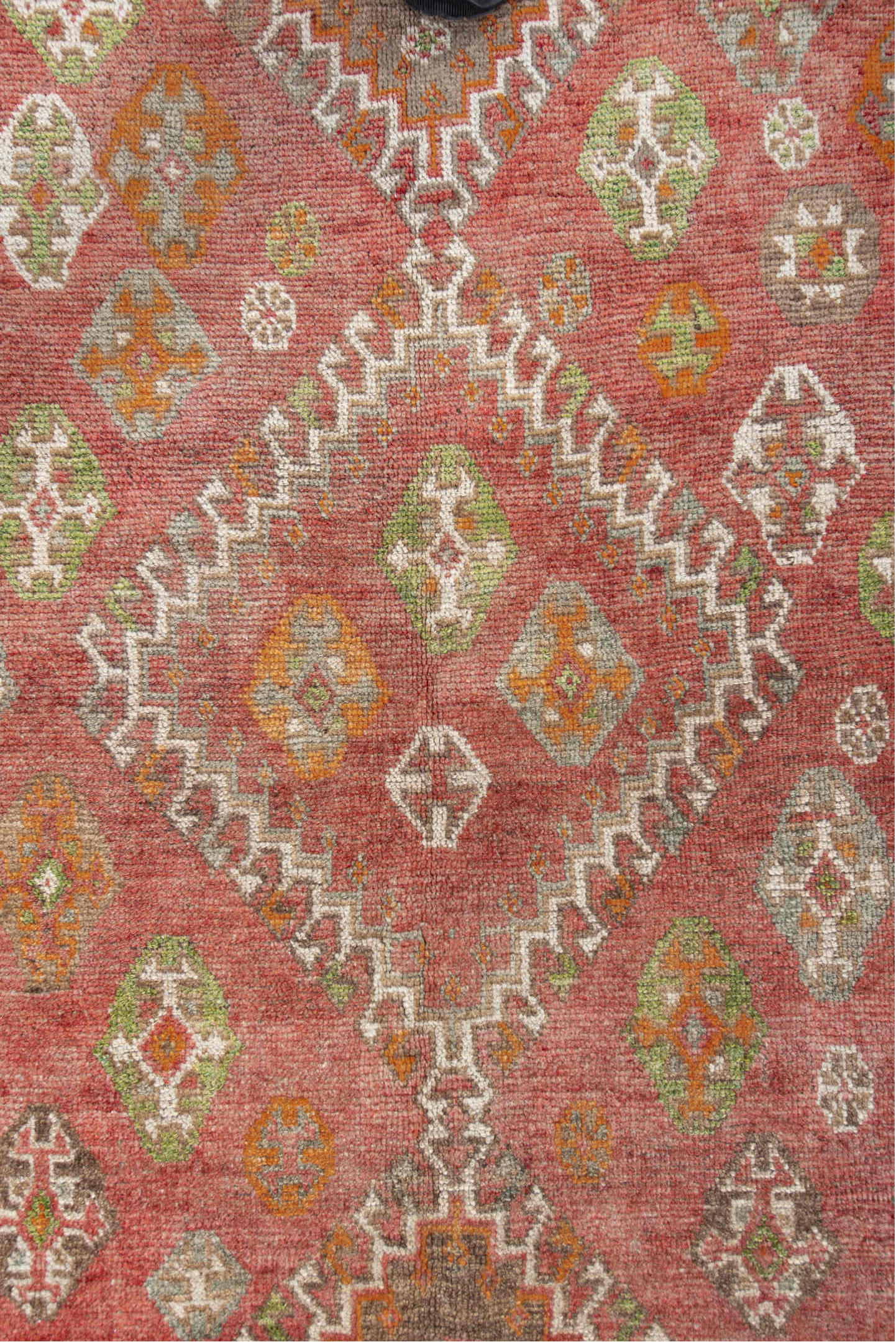 4' x 7' one-of-a-kind handmade vintage Gabbe rug. Color palette: brown, gray, light gray, off-white, orange, pink