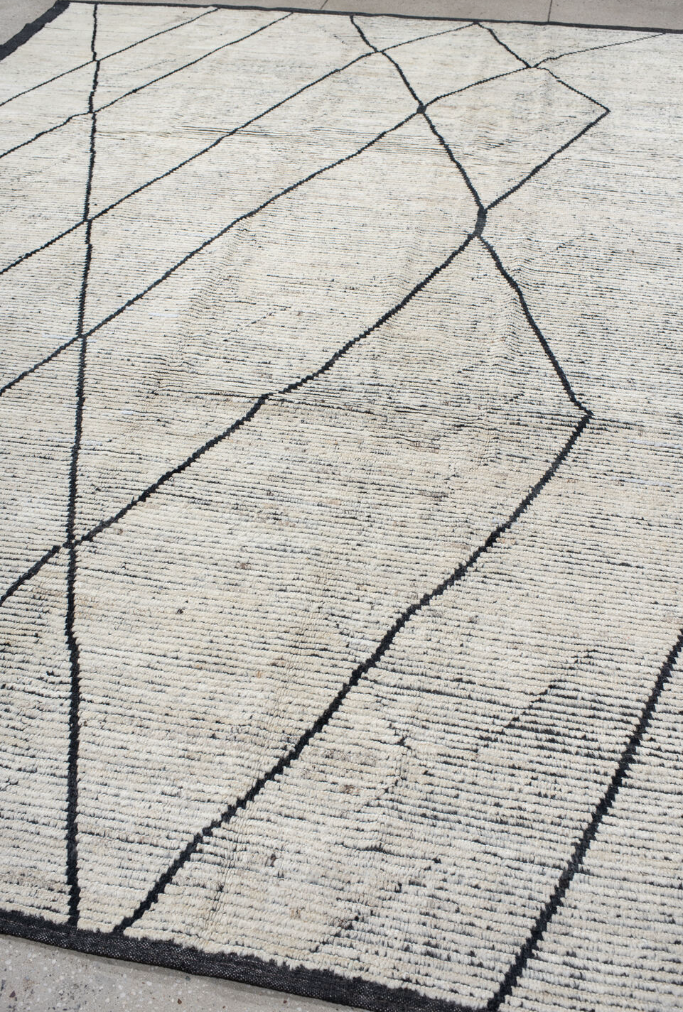 9' x 12' one-of-a-kind handmade vintage Tulu large size rug. Color palette: gray, off-white, light gray, blue, dark gray