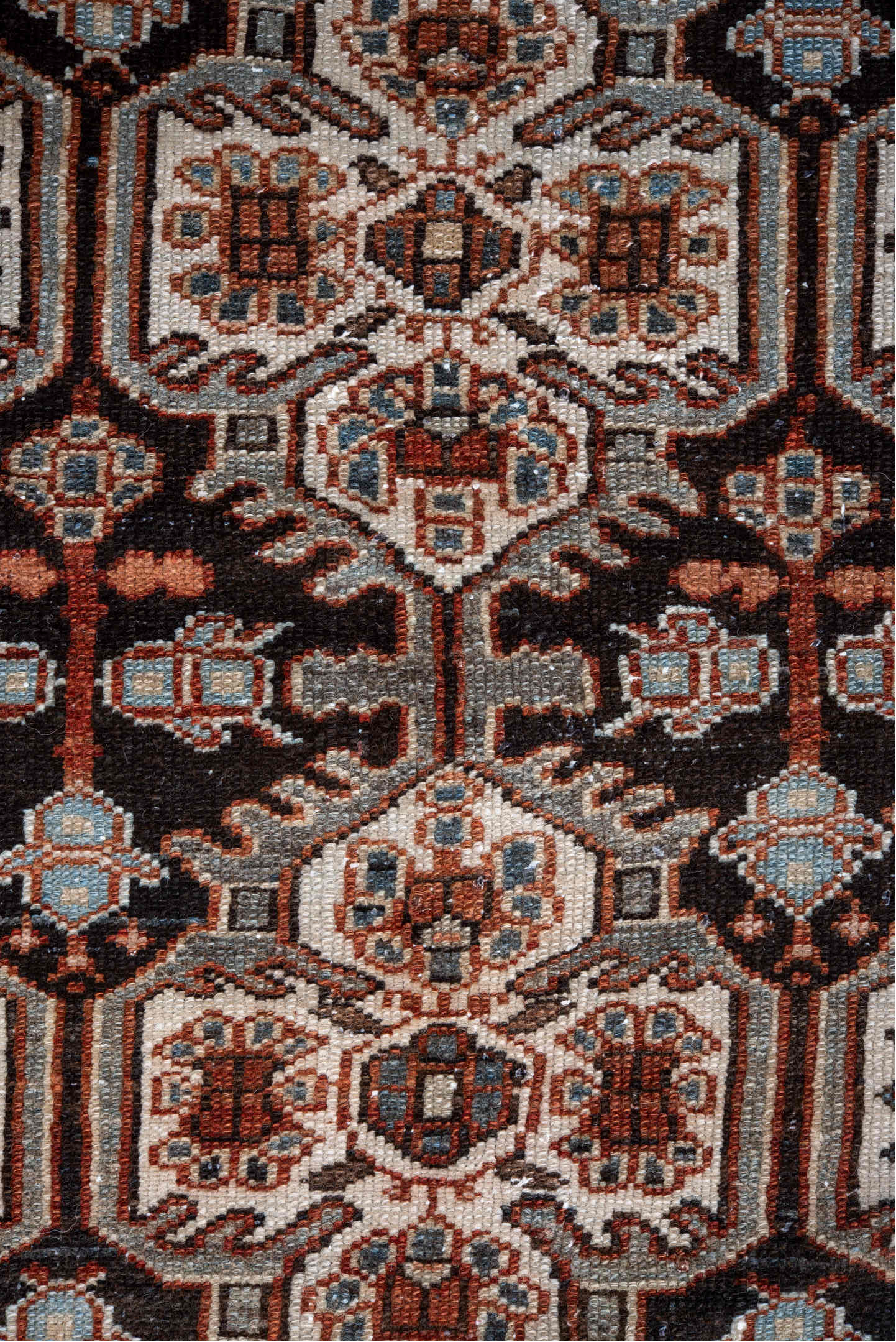 4' x 5' one-of-a-kind handmade vintage Baktiary small size rug. Color palette: black, brown, charcoal, gray, light gray