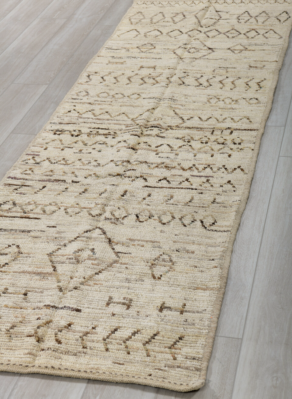 3' x 9' one-of-a-kind handmade vintage Tulu runner rug. Color palette: brown, dark gray, gray, light gray, off-white, silver