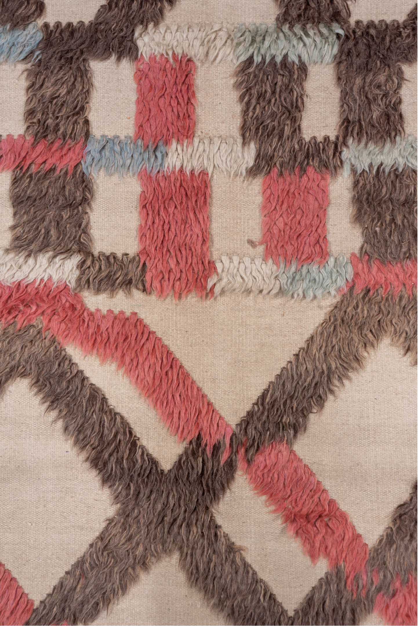 6' x 9' one-of-a-kind handmade vintage Tulu medium size rug. Color palette: brown, gray, light gray, pink, red