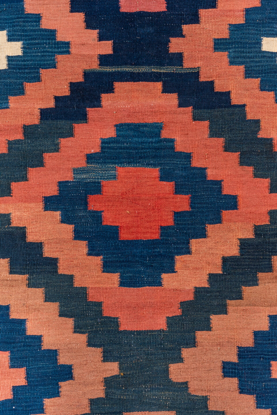 4' x 10' one-of-a-kind handmade vintage Kilim runner rug. Color palette: blue, brown, gray, off-white, orange, pink, red