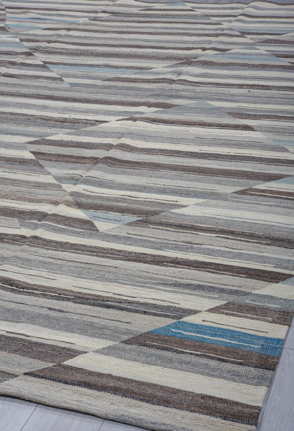 9' x 13' one-of-a-kind handmade vintage Tulu large size rug. Color palette: arapawa, black, blue, charcoal, dim gray, gray