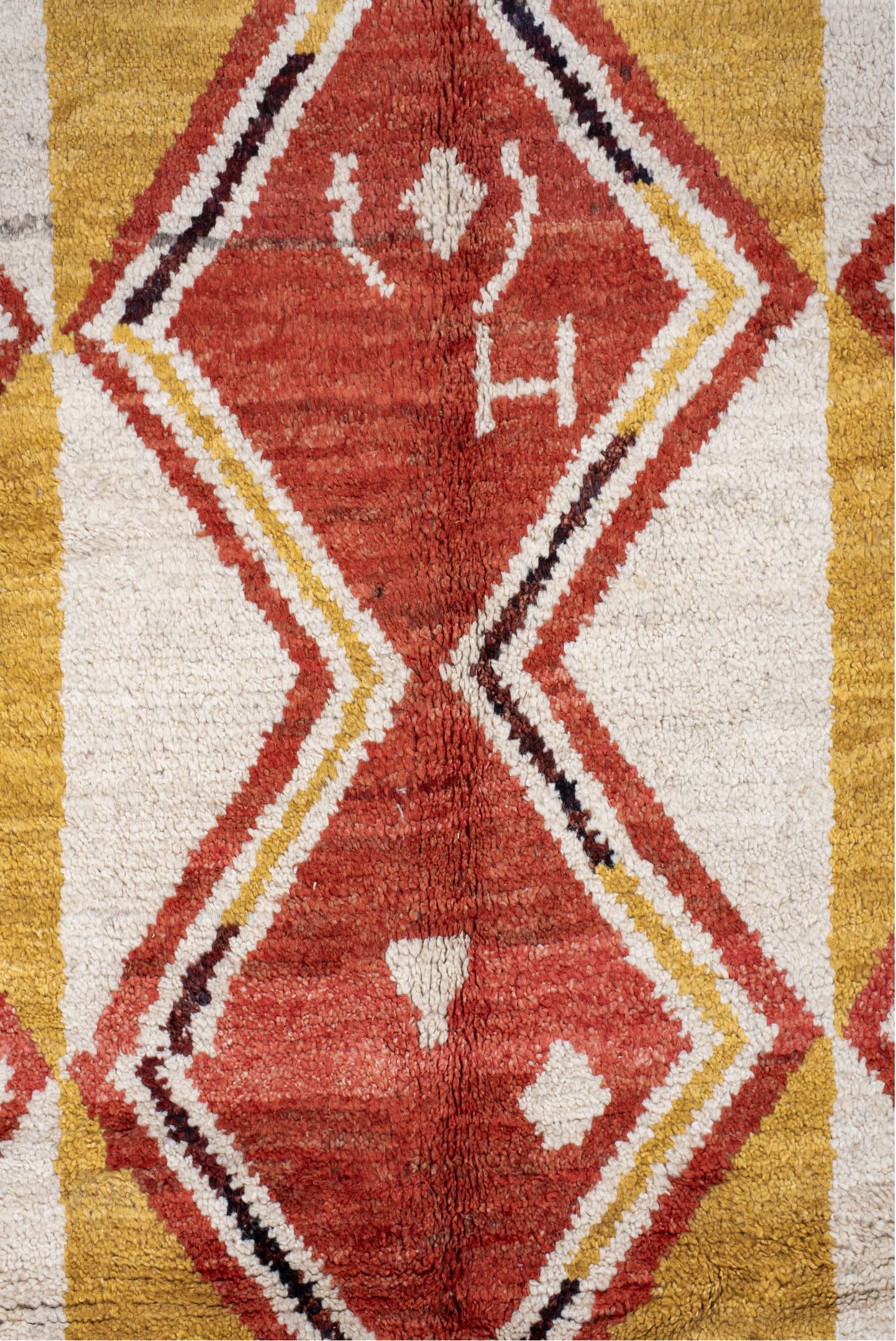 6' x 9' one-of-a-kind handmade vintage Tulu medium size rug. Color palette: brown, red, pink, light gray, off-white, gray