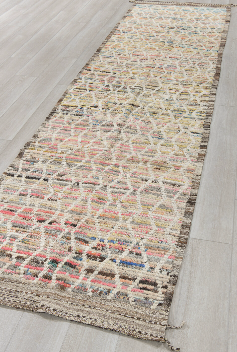 3' x 12' one-of-a-kind handmade vintage Tulu runner rug. Color palette: blue, brown, gray, indian red, light gray, off-white
