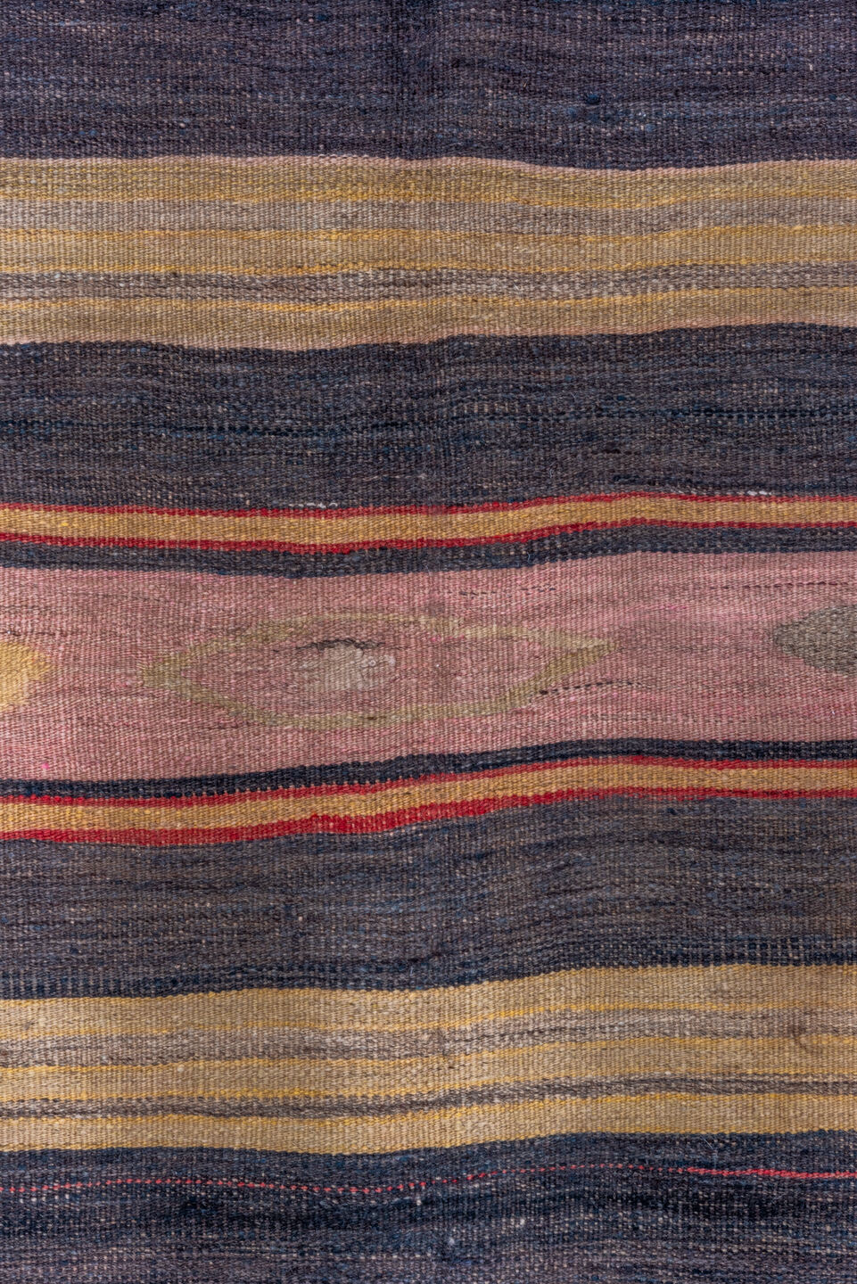 4' x 11' one-of-a-kind handmade vintage Kilim runner rug. Color palette: black, brown, charcoal, gray, pink, red