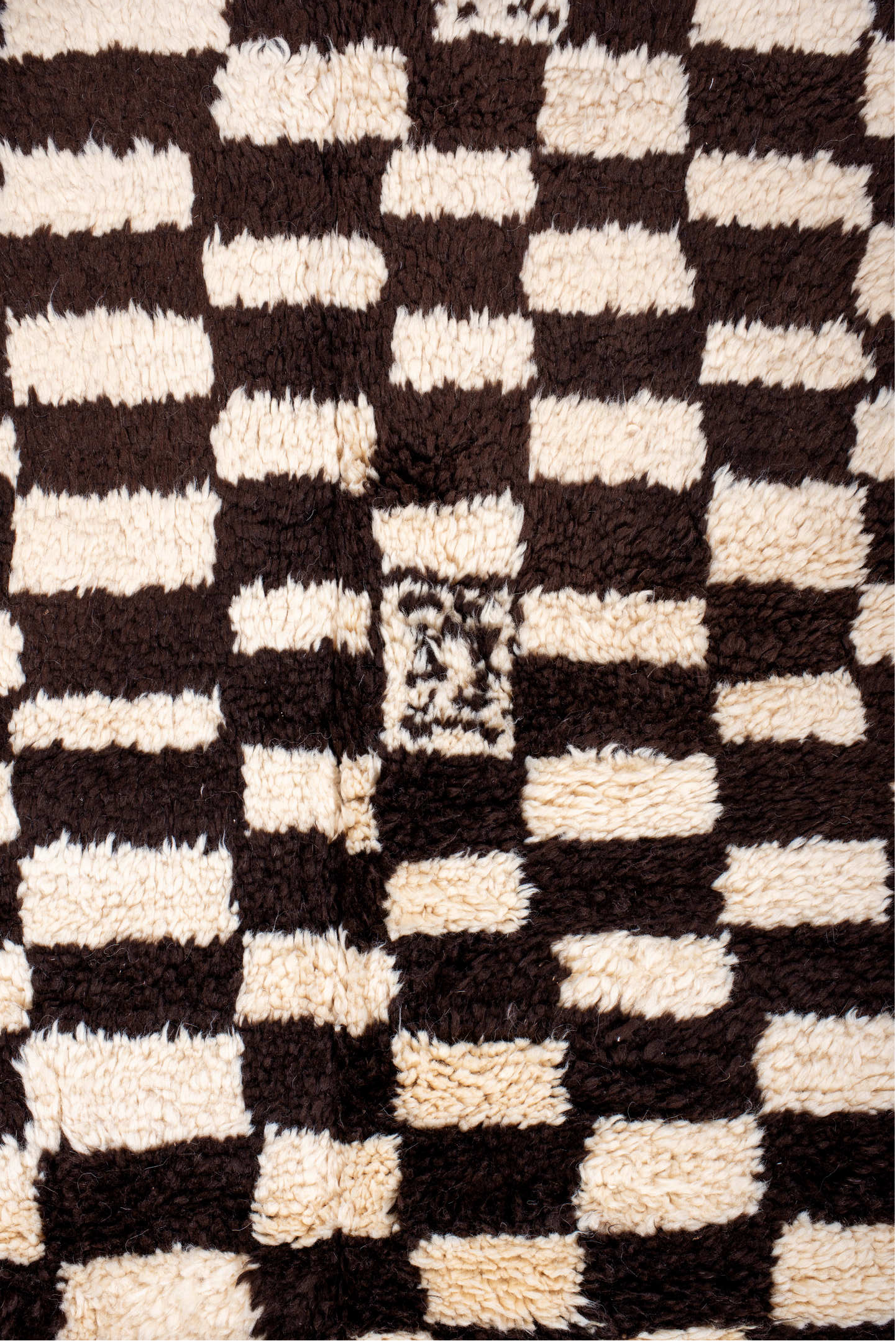 7' x 9' one-of-a-kind handmade vintage Moroccan rug. Color palette: brown, gray, light gray, pink, off-white, orange, black