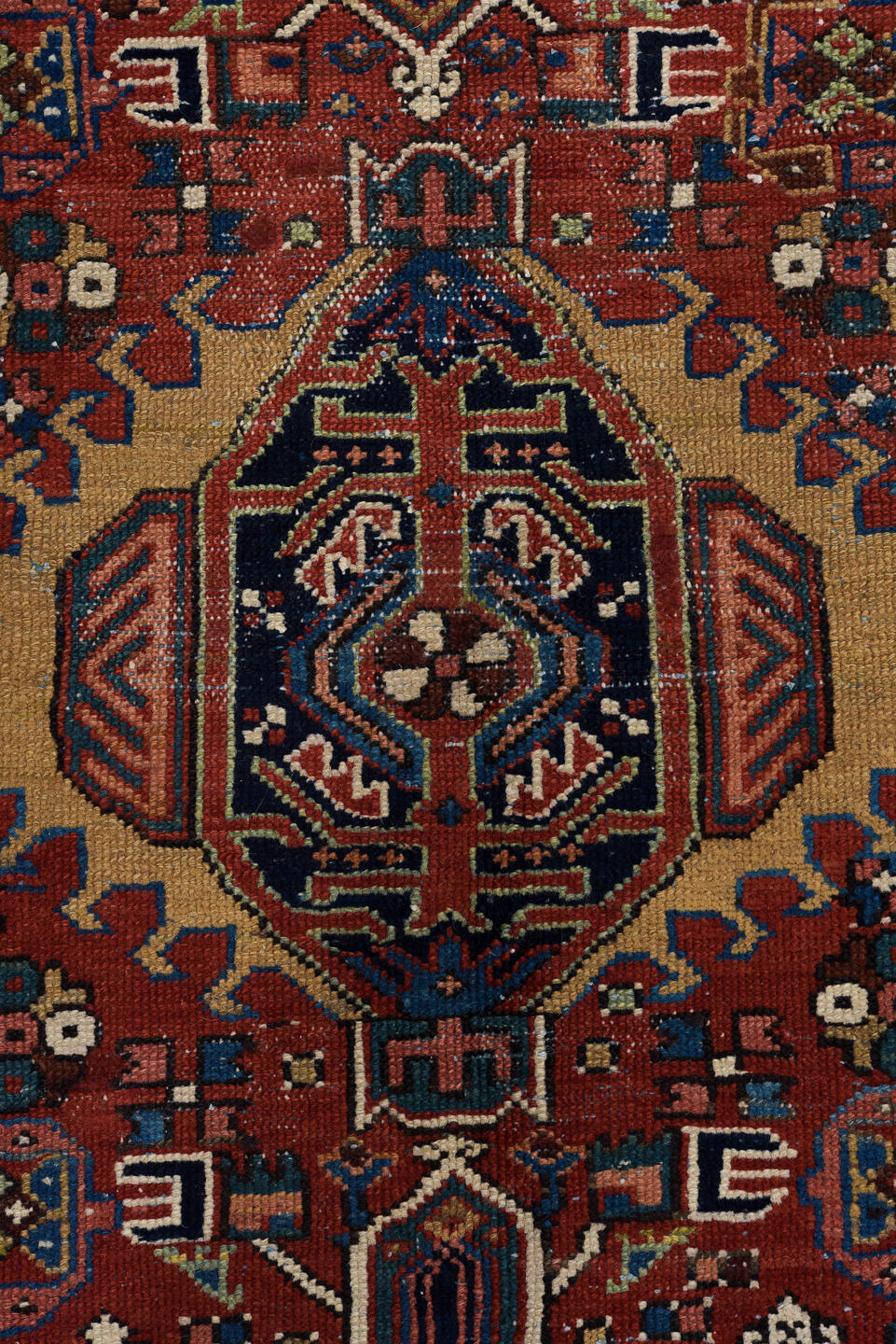 4' x 6' one-of-a-kind handmade vintage Karaje small size rug. Color palette: black, blue, brown, dark salmon, gray
