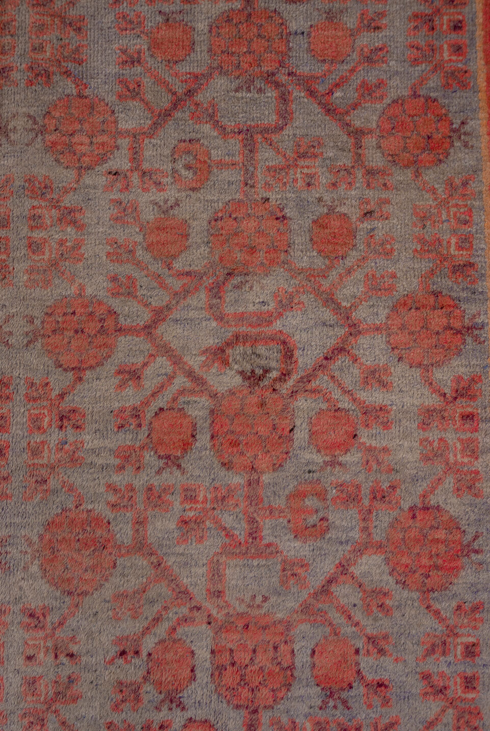 5' x 10' one-of-a-kind handmade vintage Khotan medium size rug. Color palette: brown, gray, pink, red, redwood