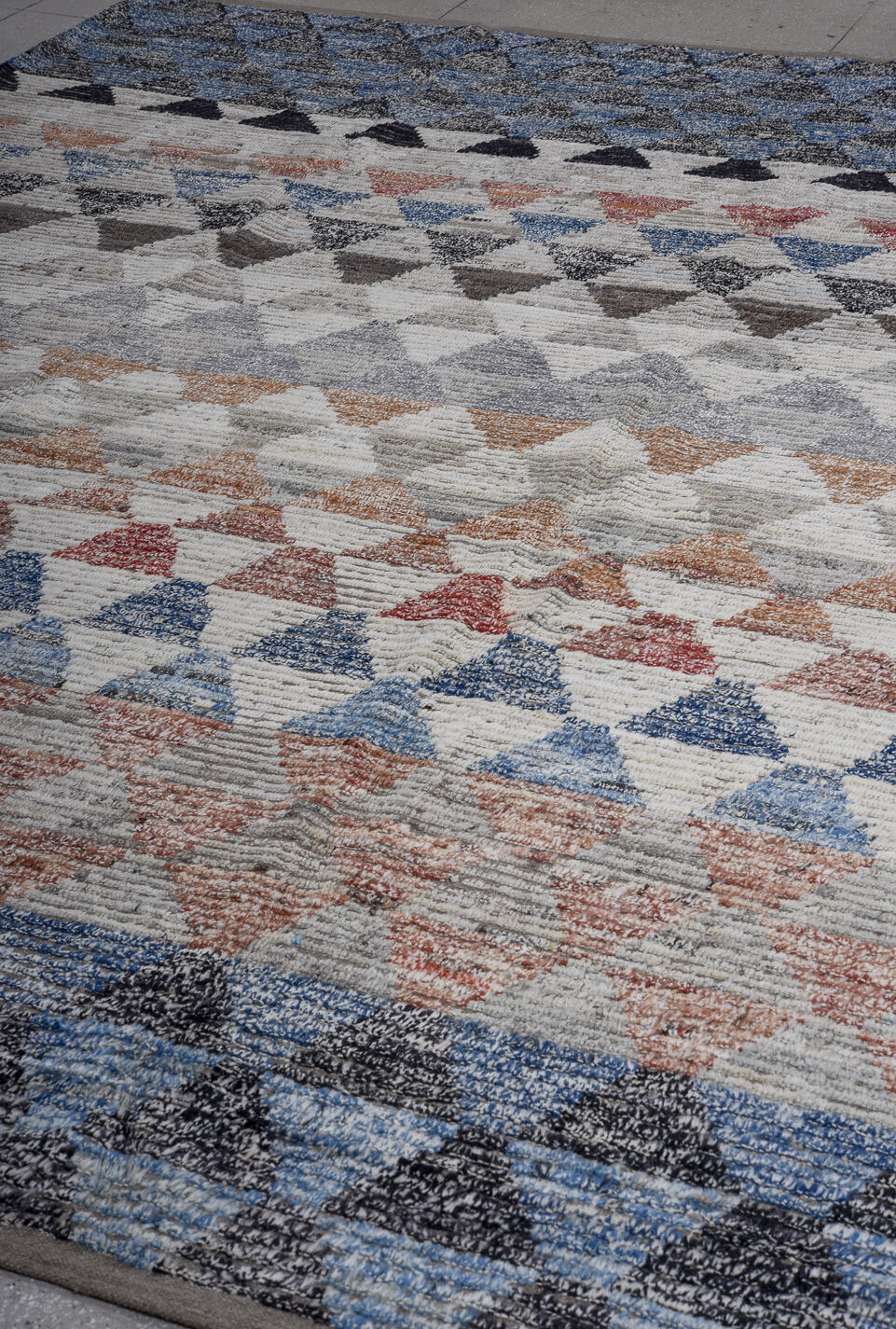 9' x 12' one-of-a-kind handmade vintage Tulu large size rug. Color palette: black, brown, gray, light gray, off-white, pink