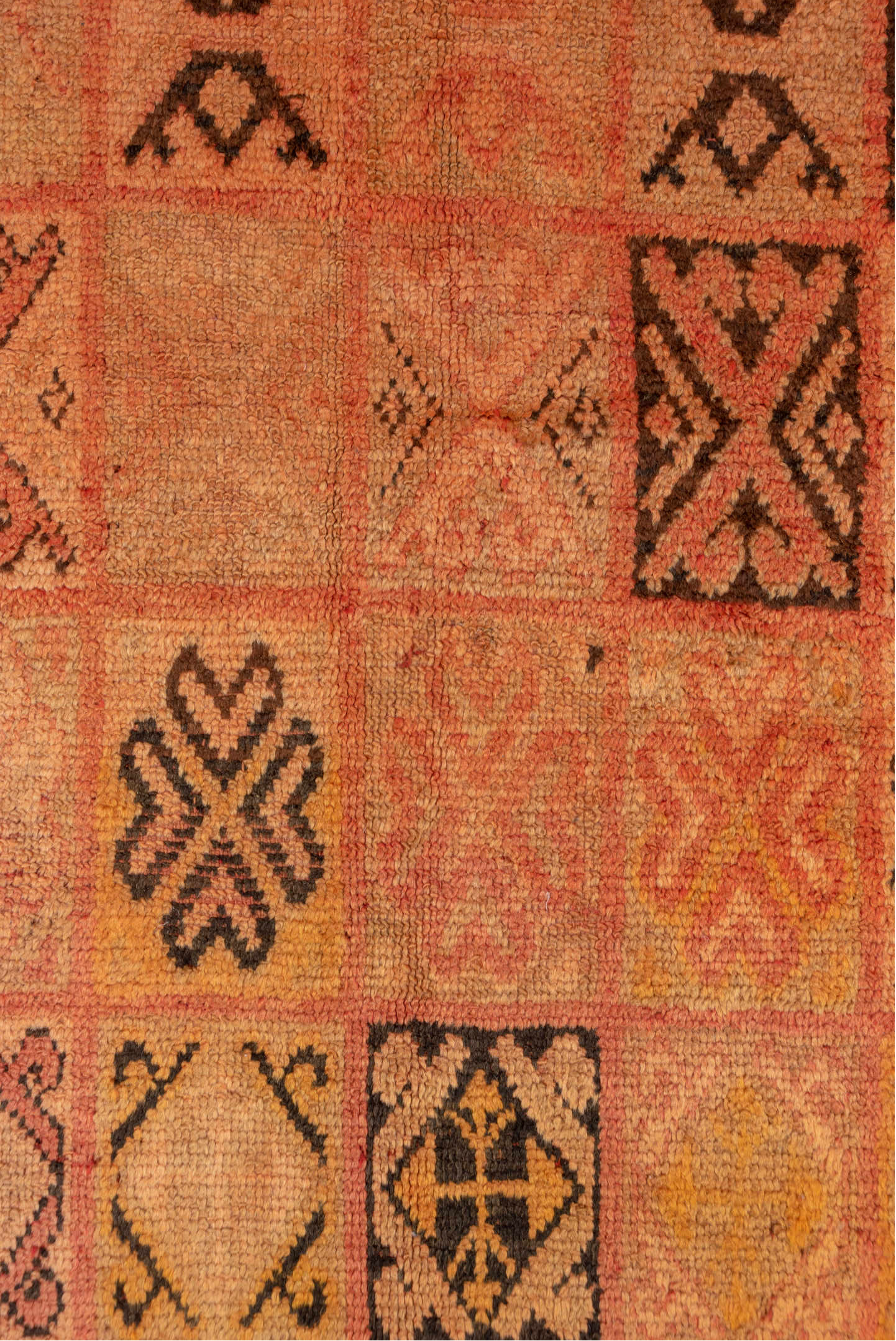 4' x 7' one-of-a-kind handmade vintage Moroccan rug. Color palette: brown, gray, orange, pink, red, sienna