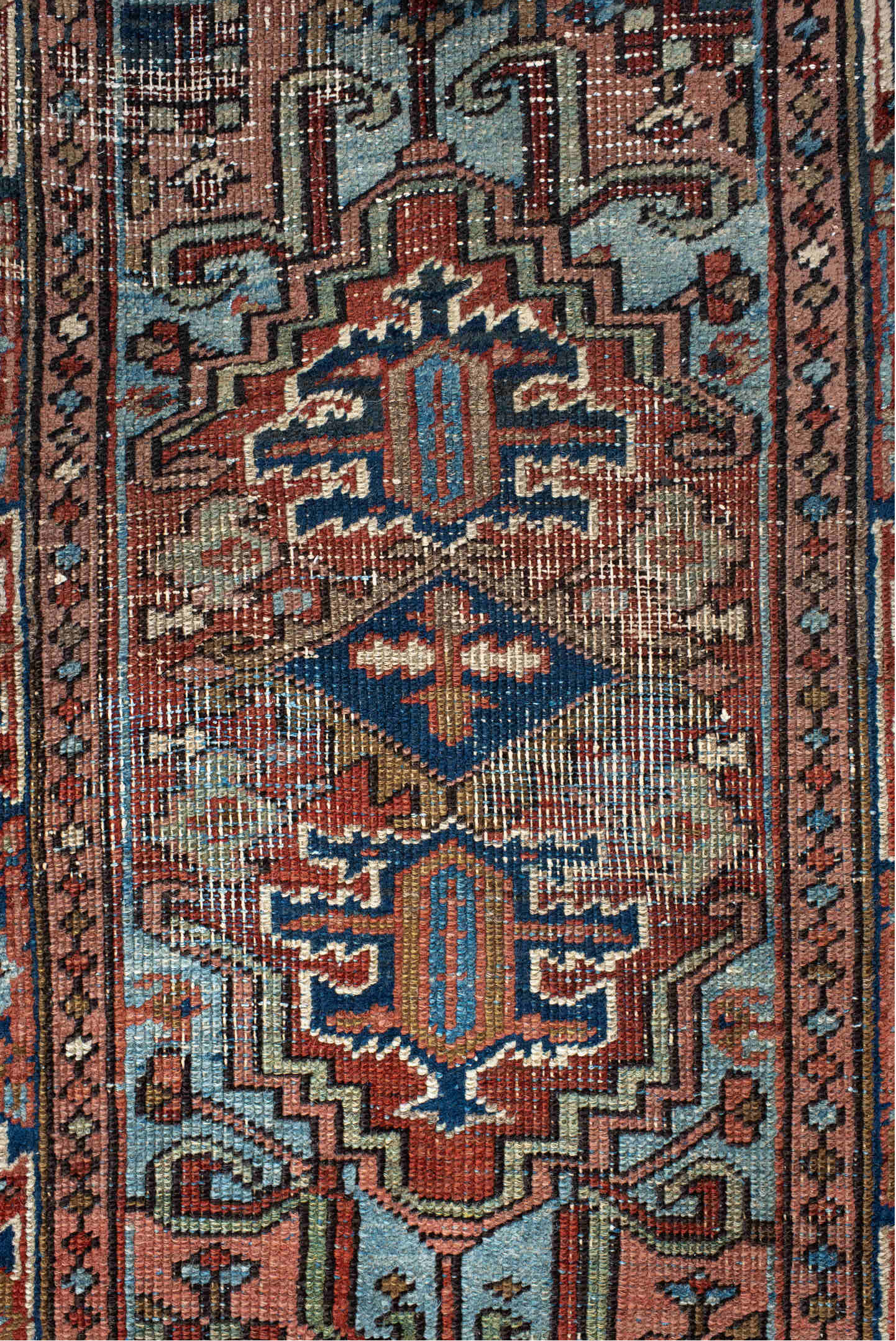 2' x 3' one-of-a-kind handmade vintage Heriz small size rug. Color palette: off-white, gray, blue, orange, pink, brown, red