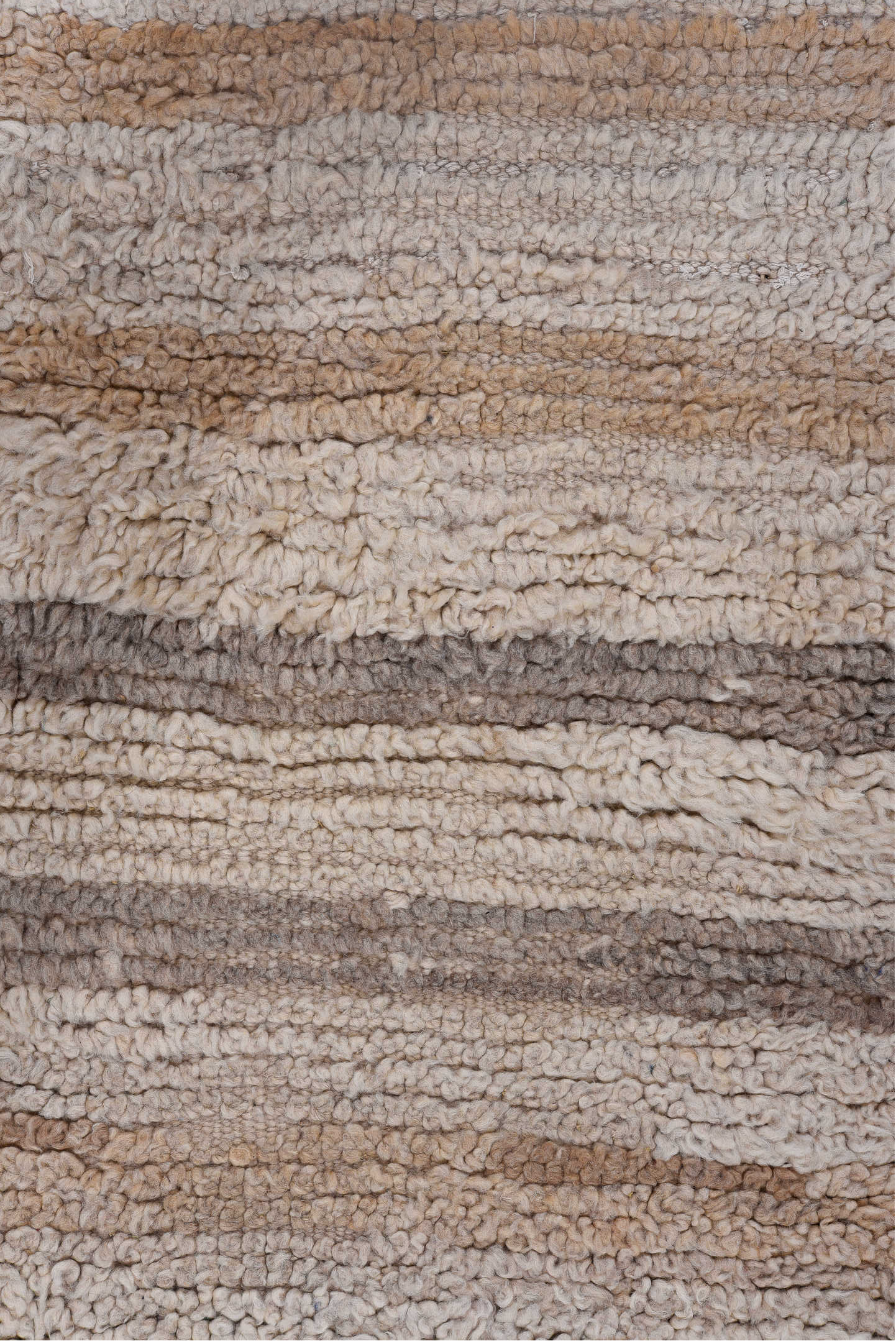 2' x 4' one-of-a-kind handmade vintage Moroccan small size rug. Color palette: brown, gray, light gray, off-white, pink