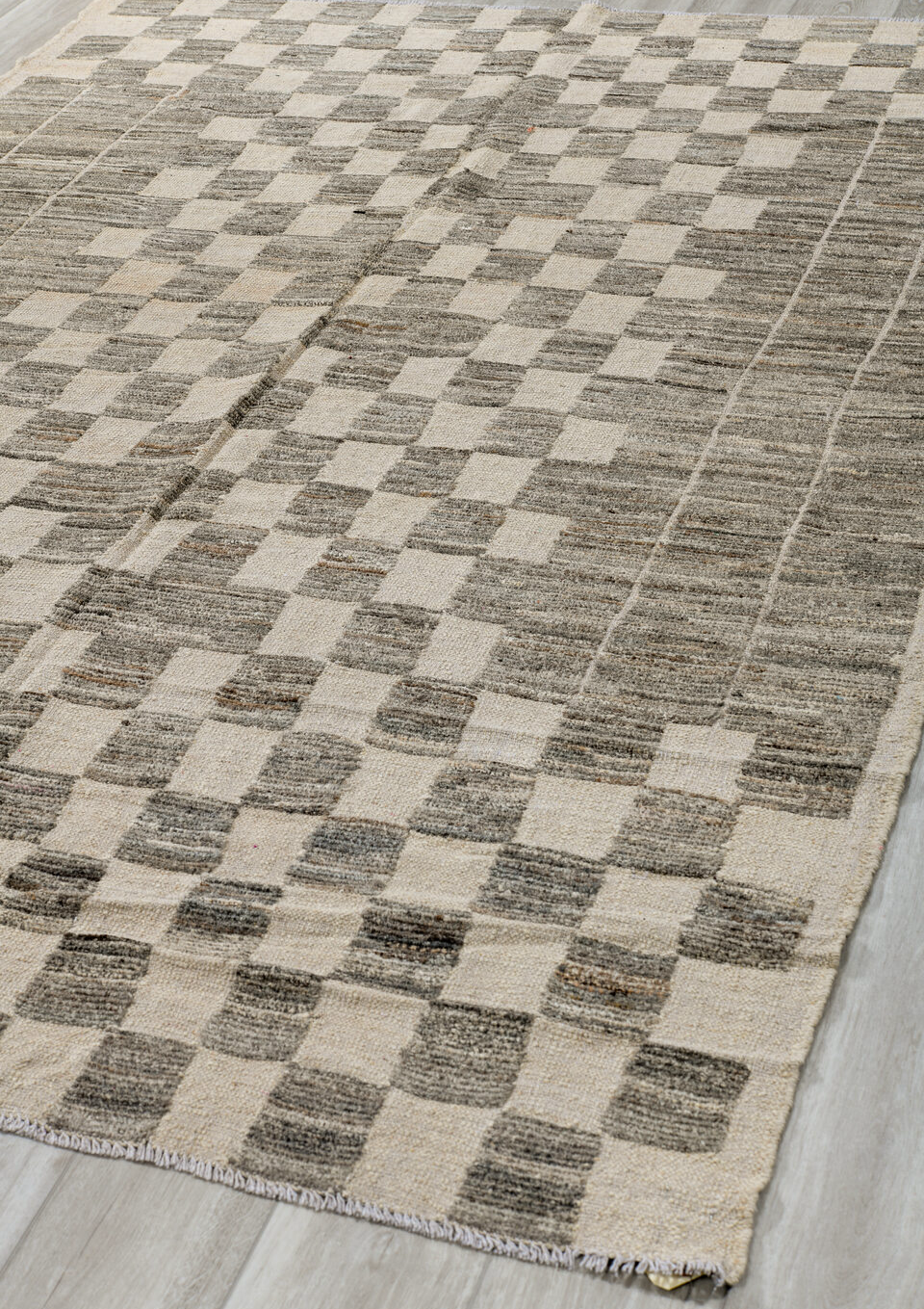 6' x 9' one-of-a-kind handmade vintage Tulu medium size rug. Color palette: black, gray, light gray, off-white, silver