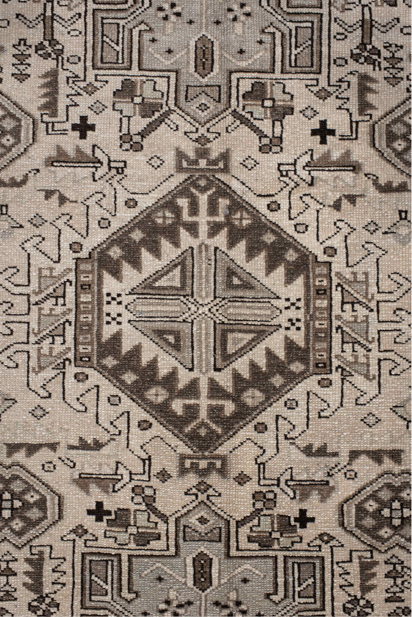 5' x 6' one-of-a-kind handmade vintage Karaje rug. Color palette: black, brown, gray, light gray, off-white, pink