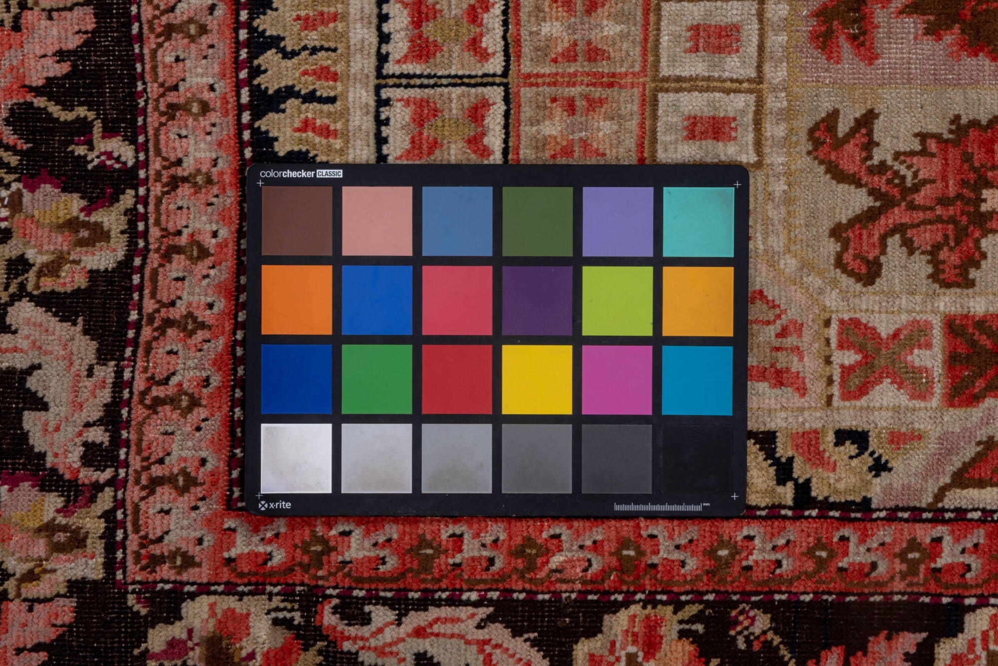 5' x 12' one-of-a-kind handmade vintage Karabagh rug. Color palette: brown, gray, pink, red, redwood