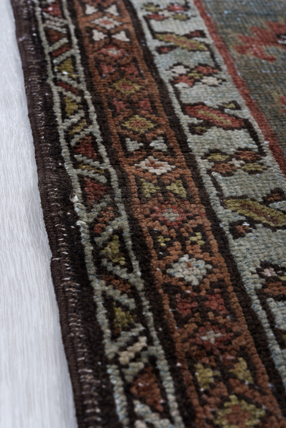 13' x 2' one-of-a-kind handmade vintage Heriz rug. Color palette: black, brown, gray, light gray, off-white, redwood, silver