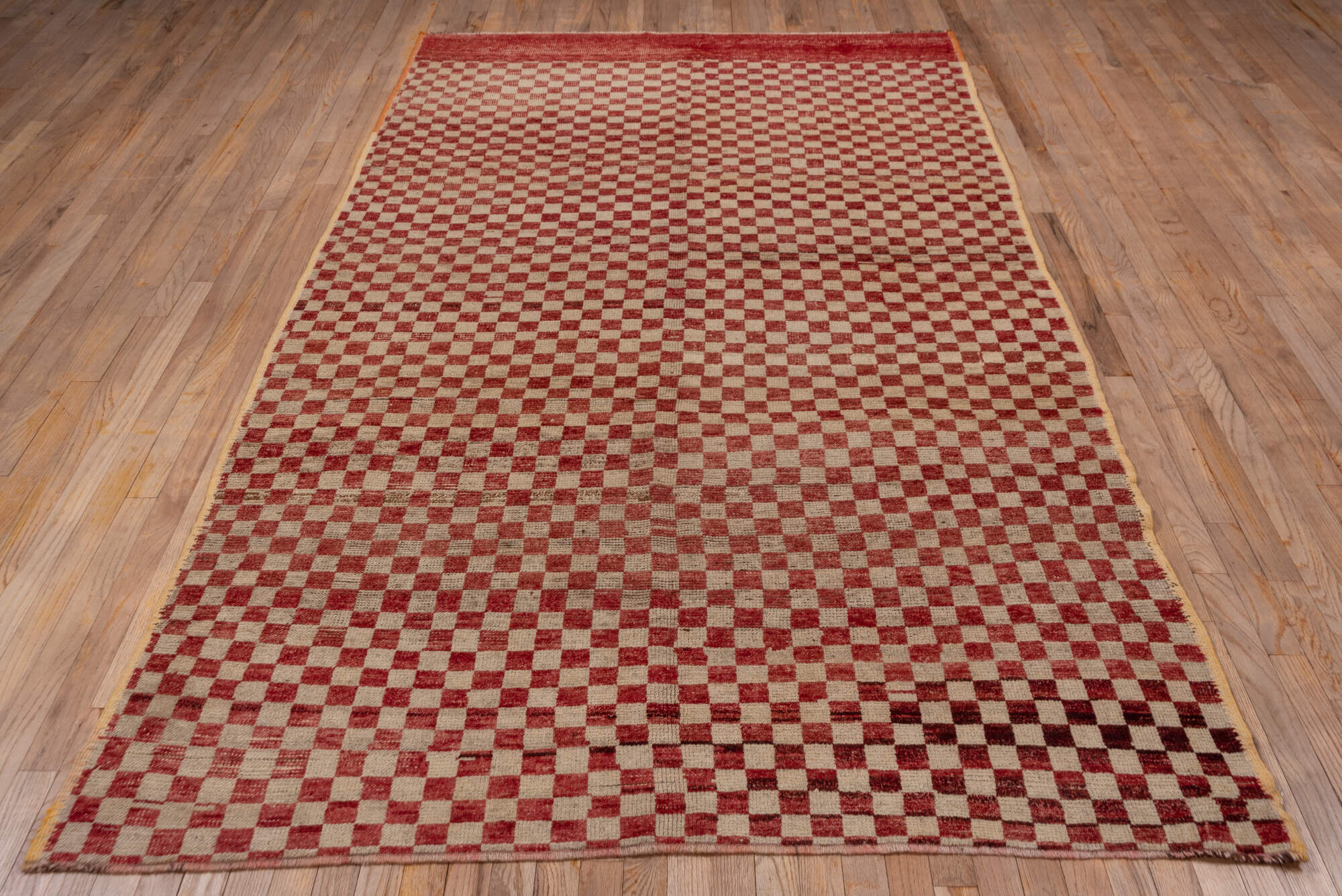 5' x 10' one-of-a-kind handmade vintage Tulu medium size rug. Color palette: brown, gray, light gray, pink, red