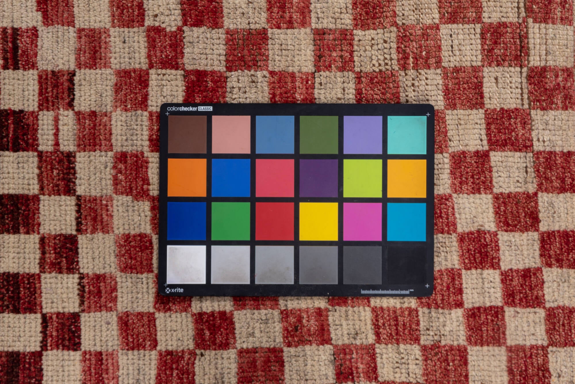 5' x 10' one-of-a-kind handmade vintage Tulu medium size rug. Color palette: brown, gray, light gray, pink, red