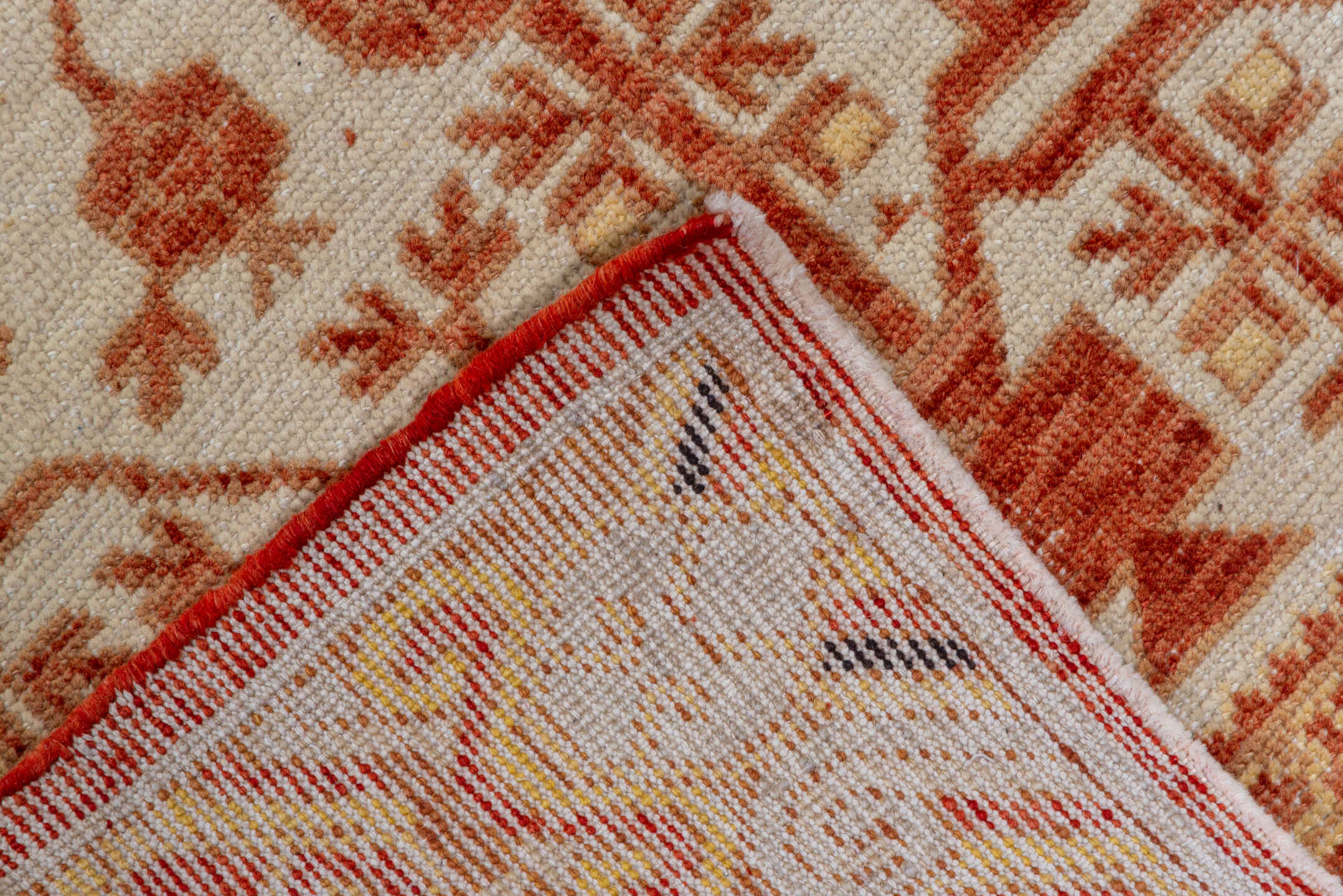 3' x 16' one-of-a-kind handmade vintage Khotan runner rug. Color palette: brown, orange, off-white, pink, white, snow