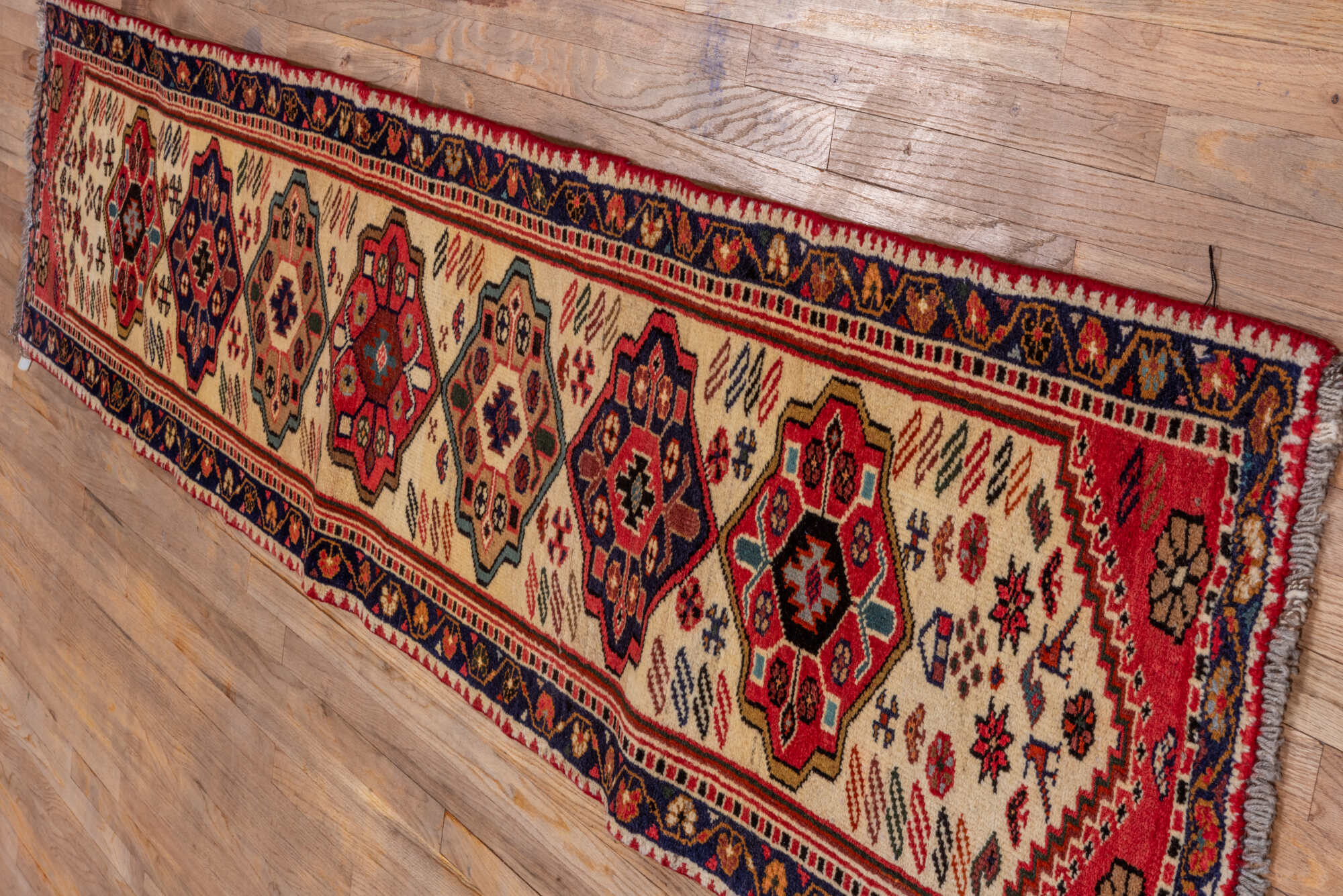 2' x 10' one-of-a-kind handmade vintage Veece runner rug. Color palette: brown, gray, orange, pink, red, tan