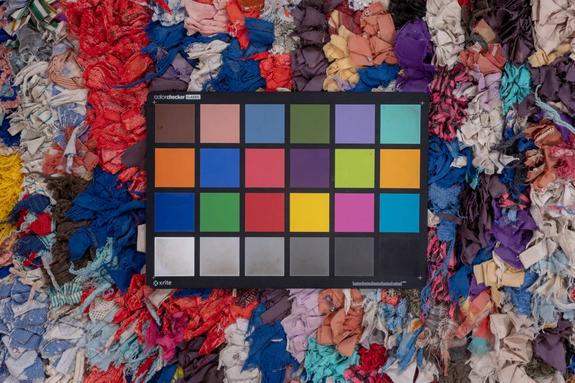 4' x 7' one-of-a-kind handmade vintage Rag Rug rug. Color palette: blue, brown, dark gray, gray, green, light gray