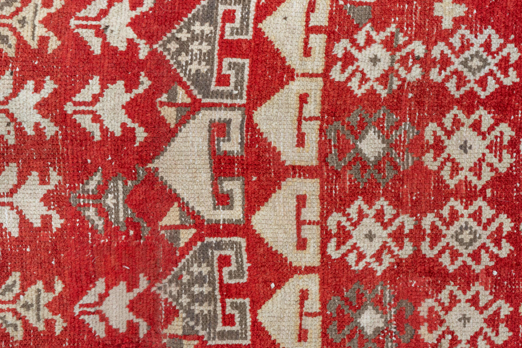 4' x 13' one-of-a-kind handmade vintage Caucasian runner rug. Color palette: brown, gray, pink, red